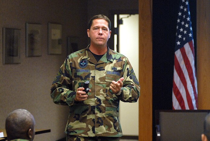 Senior Master Sgt. James Woodham, First Sergeant Academy director of education, conducts training for 23 SNCOs Dec. 7 on first sergeant responsibilities while conducting dormitory rooms inspections on Charleston AFB. (U.S. Air Force photo/Tech. Sgt. Paul Kilgallon)