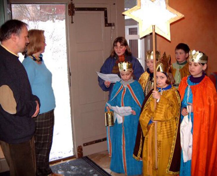 Children disguised as the Holy Three Kings go from house to house to collect donations for their church. Courtesy photo