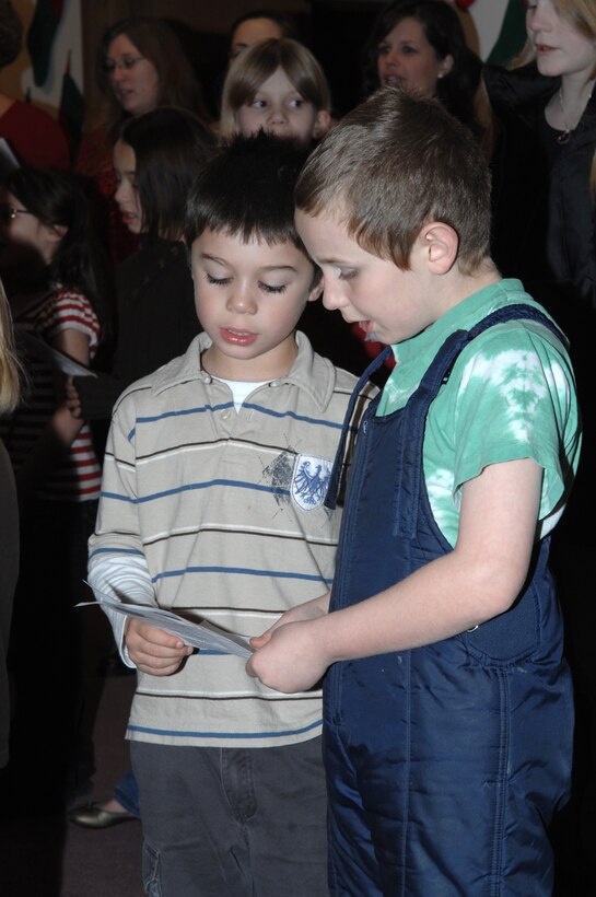 Ellsworth celebrates the Christmas holiday with the annual tree lighting ceremony and caroling put on by the Freedom Chapel, Dec. 11.  Many Airman and their families withstood the bitter cold to watch the Christmas tree lighting. (U.S. Air Force photo / Airman 1st Class Anthony Sanchelli)