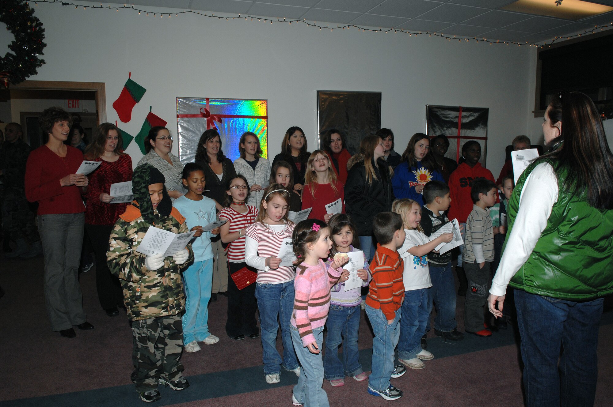 Ellsworth celebrates the Christmas holiday with the annual tree lighting ceremony and caroling put on by the Freedom Chapel, Dec. 11.  Many Airman and their families withstood the bitter cold to watch the Christmas tree lighting. (U.S. Air Force photo / Airman 1st Class Anthony Sanchelli)