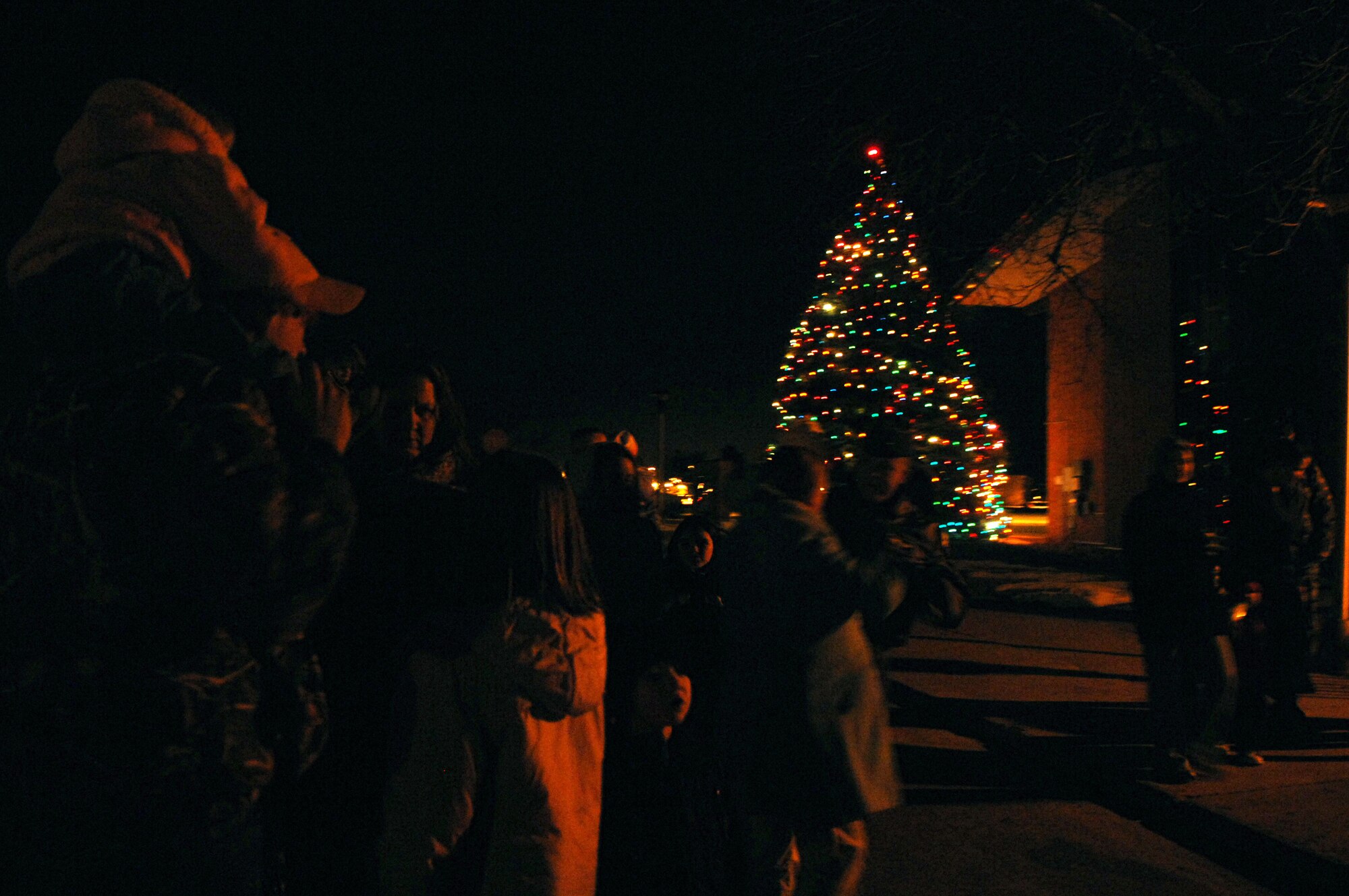 Ellsworth celebrates the Christmas holiday with the annual tree lighting ceremony put on by the Freedom Chapel, Dec. 11.  Many Airman and their families withstood the bitter cold to watch the Christmas tree lighting. (U.S. Air Force photo / Airman 1st Class Anthony Sanchelli)