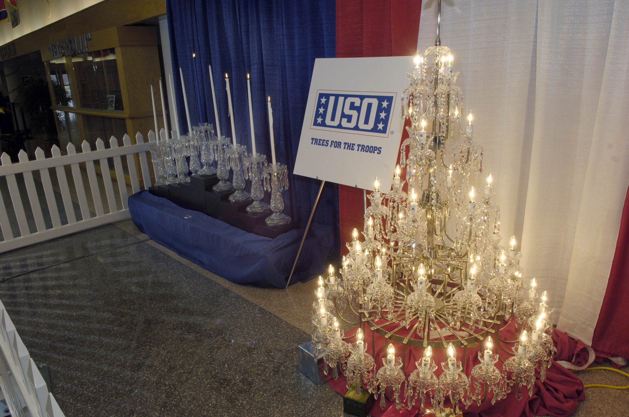 MCGUIRE AFB, N.J. -- A ighting ceremony for a Waterford Crystal Christmas tree and menorah was held Dec. 7 at McGuire Air Force Base's passenger terminal. Waterford Wedgford USA in association with the Liberty USO donated the crystal gemstones for display until Jan. 3. (U.S. Air Force photo/Kenn Mann)