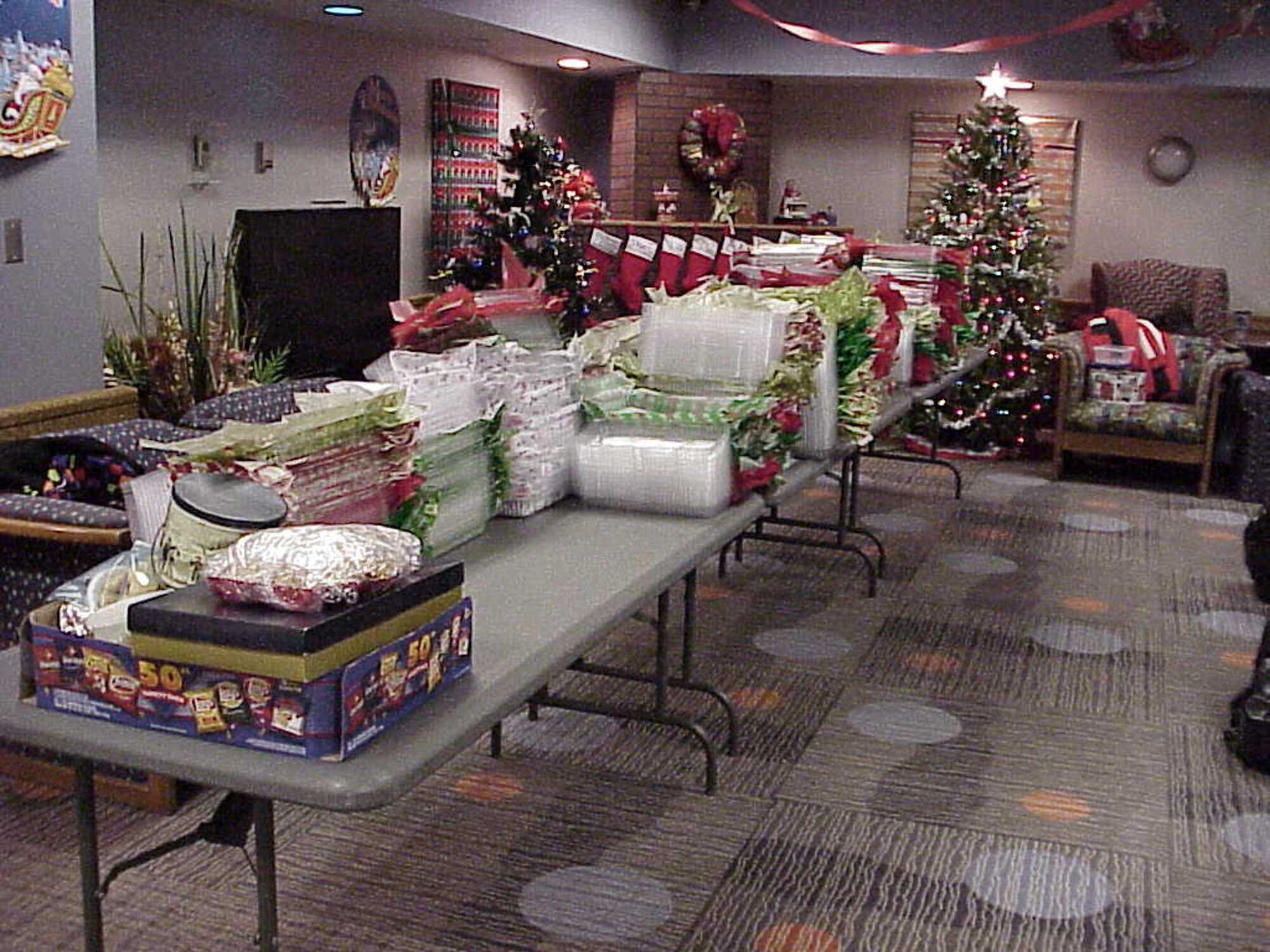 Prepared plastic containers, lined with tissue paper, sit, waiting to be filled with cookies during the annual Airman's Holiday Cookie Drive Dec. 6.  (Courtesy photo)