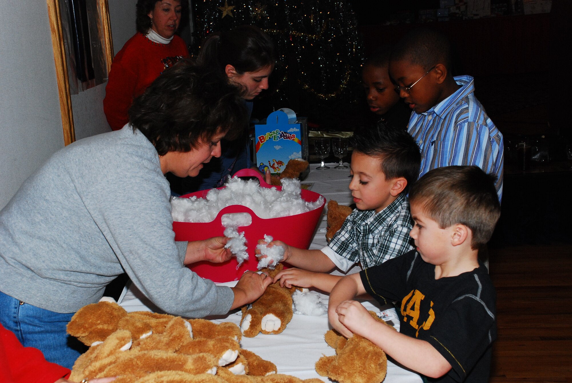 Children had the opportunity to make their own “build-a-bear” during the annual Hearts Apart Christmas Party here. The children also enjoyed a visit from Santa Claus and several gift give-aways from the McGuire Airman and Family Readiness Center. (U.S. Air Force photo/Airman 1st Class Rebekah Phy)  
