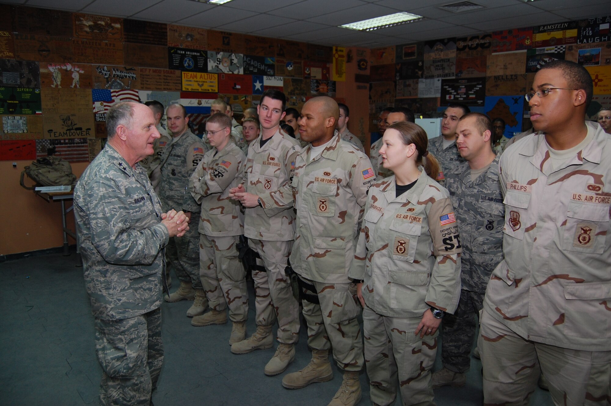 SOUTHWEST ASIA – Maj. Gen. Charles Baldwin briefs Airmen of the 387th Expeditionary Security Forces Squadron during guard mount at an air base in the Middle East Nov. 6. During his briefing, Chap. Baldwin told Airmen their religious freedom is his priority. Chaplain Baldwin is the Air Force’s chief of chaplains. (Air Force photo\ Staff Sgt. Phillip Butterfield)
 
