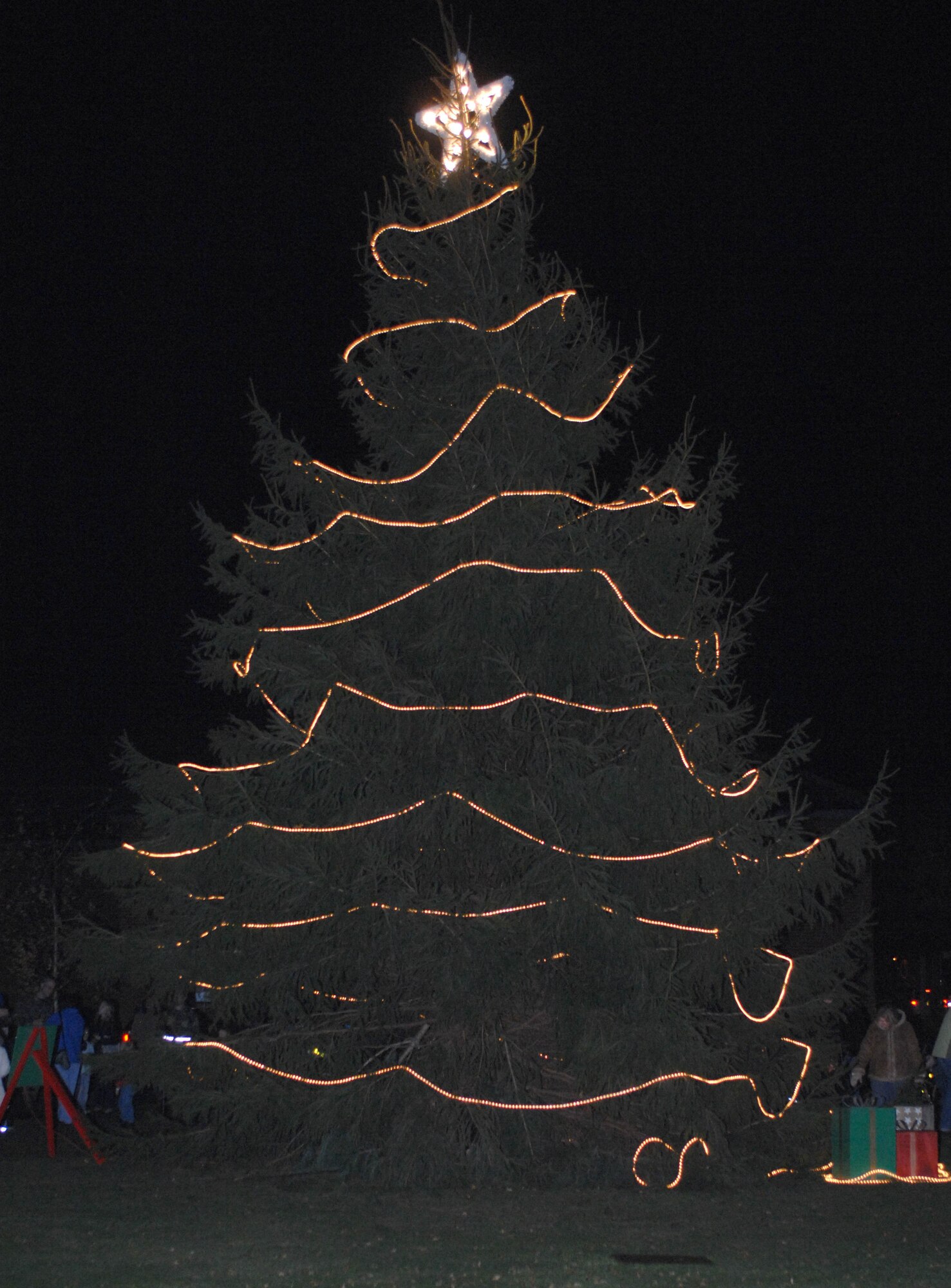 The RAF Mildenhall Christmas was lit during a tree-lighting ceremony Dec. 6, 2007. (U.S. Air Force photo by Airman 1st Class Brad Smith)