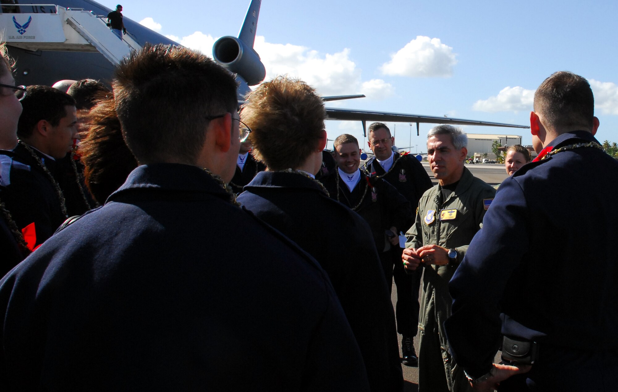 Col. Torres, 15th Airlift Wing commander, tells Tops in Blue members a little about Hickam and the surrounding area, upon their arrival. Tops in Blue performers have a few days of down time before their performance, Dec. 15 at 7 p.m. at the Freedom Tower Mall. Photo by Staff Sgt. Erin Smith