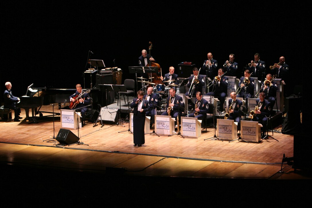 Technical Sgt Paige Martin singing with the Airmen of Note, the premier jazz ensemble of the United States Air Force, at Lisner Auditorium in Washington, D.C. during a 2007 Jazz Heritage Series concert.  (U.S. Air Force photo by SMSgt Robert Mesite)