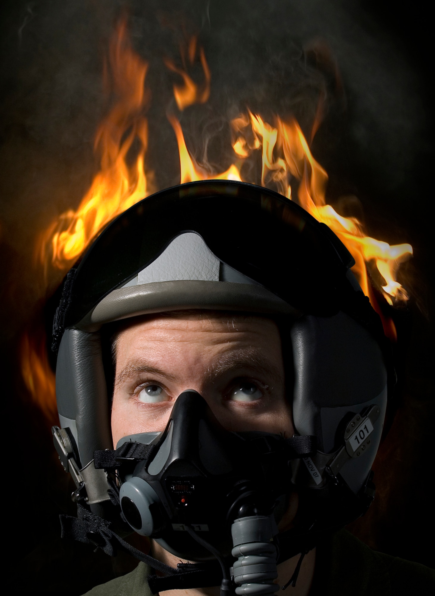 ‘Helmet fires’ (otherwise known as task saturation, mis-prioritization, situational awareness and channelized attention) can get the best of us, resulting in mishaps. (photo by Tech. Sgt. Matthew Hannen / composite by David M. Stack)