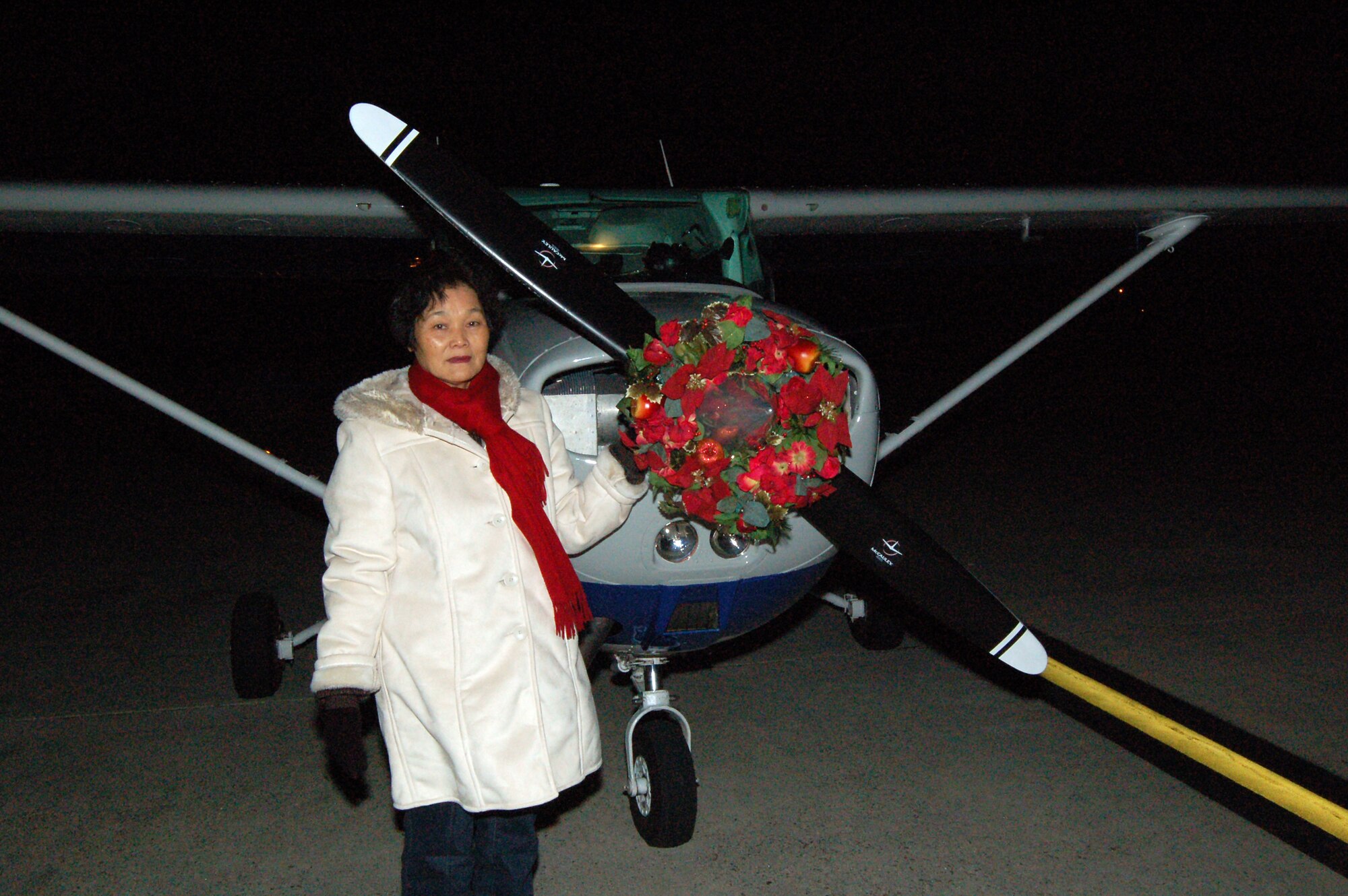 Shizue Toma took a Dover Air Force Base Aero Club Christmas Light Flight Dec. 12. The Aero Club offers the flights every night through Dec. 30 from dusk to 8:30 p.m. (U.S. Air Force photo/Tech. Sgt. Kevin Wallace)