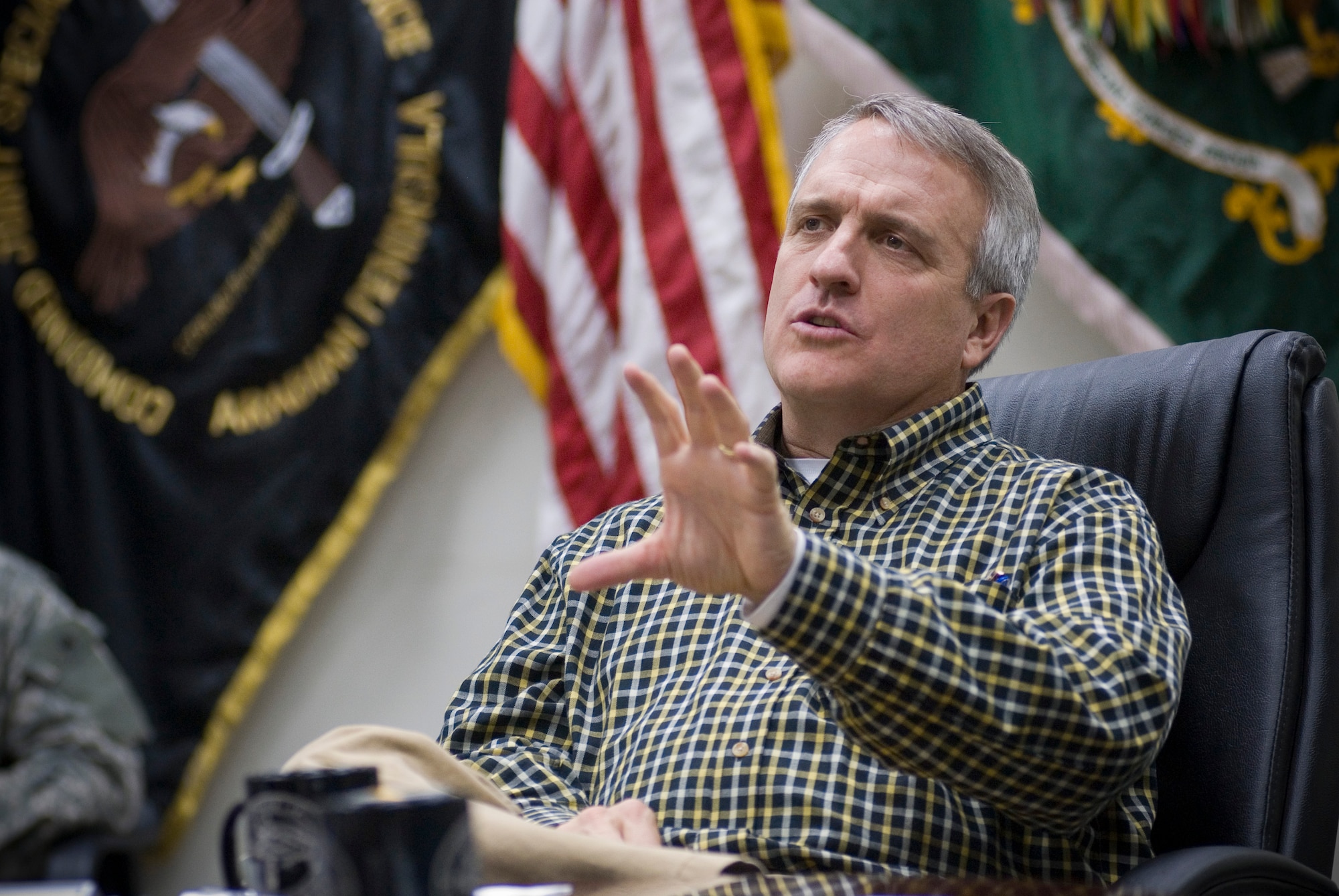 BALAD AIR BASE, Iraq -- Colorado Gov. Bill Ritter receives a situational awareness briefing from senior leaders of the Combined Joint Special Operations Task Force, Arabian Peninsula, here, Dec. 12. The Secretary of Defense invited governors to the area of responsibility to visit National Guardsmen deployed from their home states and to gain insight into the ongoing war on terror. (U.S. Air Force photo/Master Sgt. John Nimmo, Sr.) 