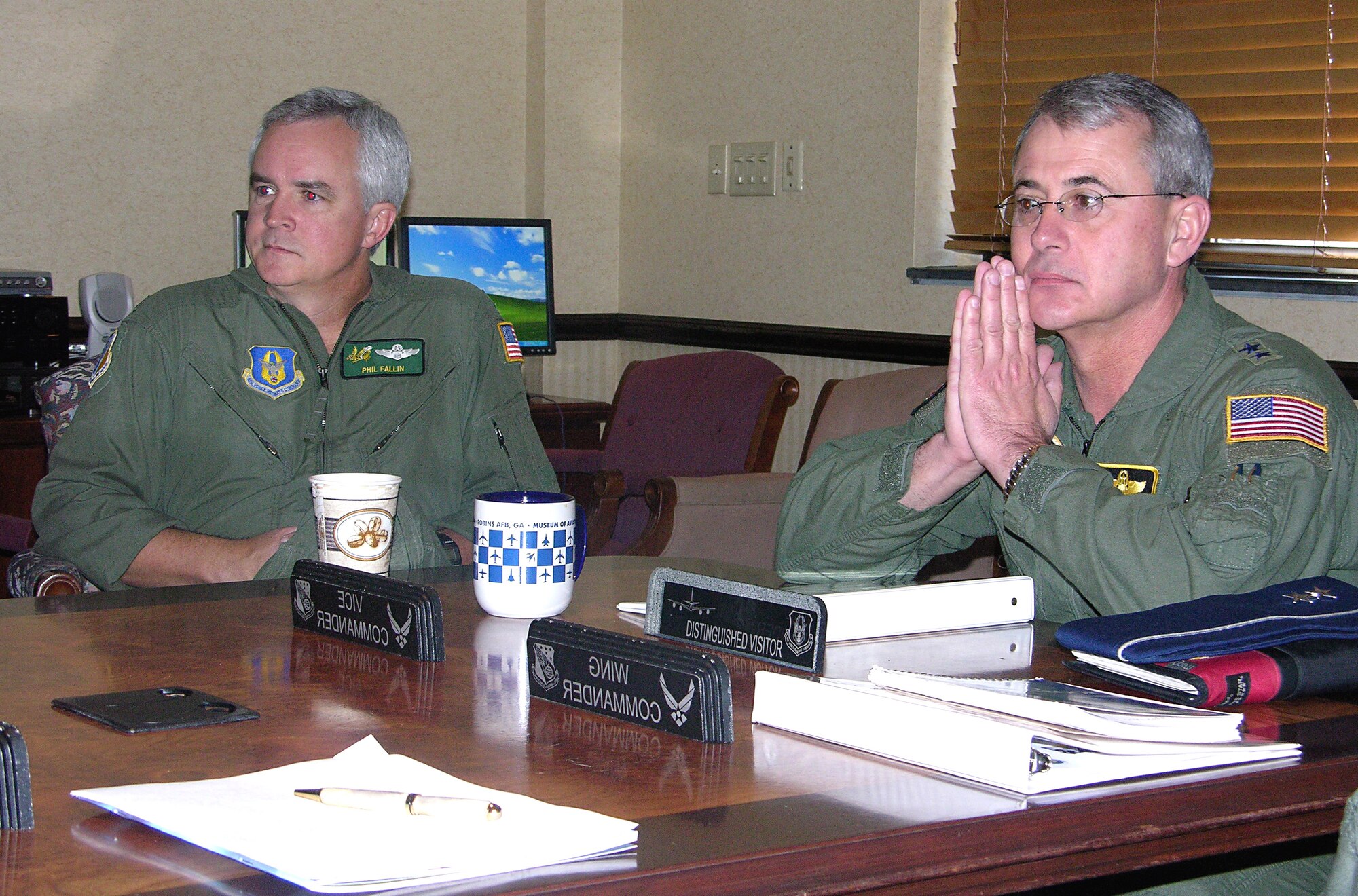 SEYMOUR JOHNSON AIR FORCE BASE, N.C.--Col. Phil Fallin, vice commander of the 916th Air Refueling Wing, and Maj. Gen. Jack Ramsaur, the former vice commander here and now the vice commander for the U.S. Strategic Command, attend a briefing regarding the recent base realignment and closure actions for the 916th ARW. General Ramsaur took some time to visit some familiar faces at the wing during his visit here on Dec. 6.