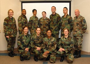 Air Force Reservists from the 940th Air Refueling Wing graduated from the Non-Commissioned Officer Leadership Development Program Dec. 14, 2007 at Beale Air Force Base, Calif. The 10-day course provided the NCOs the tools necessary to develop them as successful leaders and supervisors, according to Master Sgt. Jennifer Henderson, course facilitator and client support administrator from the 934th Airlift Wing, Minneapolis-St. Paul Air Reserve Station, Minn.  Top row, left to right, Sergeant Henderson; Staff Sgt. William Coward, 940th Military Personnel Flight; Tech. Sgt. Dorian Banks, 940th MPF; Senior Airman Jolee Backer, 940th Maintenance Squadron; Staff Sgt. William Cain III, 940th Civil Engineer Squadron; Senior Airman Ross Smathers, 940th MXS; and Senior Master Sgt. Robert Nutting, course facilitator and 80th Aerial Port Squadron strategic planner, Dobbins ARS, Ga.  Front row, left to right, Tech. Sgt. Anna Sandoval, 940th Services Flight; Senior Airman Myrna Flagg, 940th Air Refueling Wing Finance Office; Staff Sgt. Elenor Torres, 940th MXS; and Staff Sgt. Amber Albano, 940th CES. (U.S. Air Force photo/Stacey Knott)