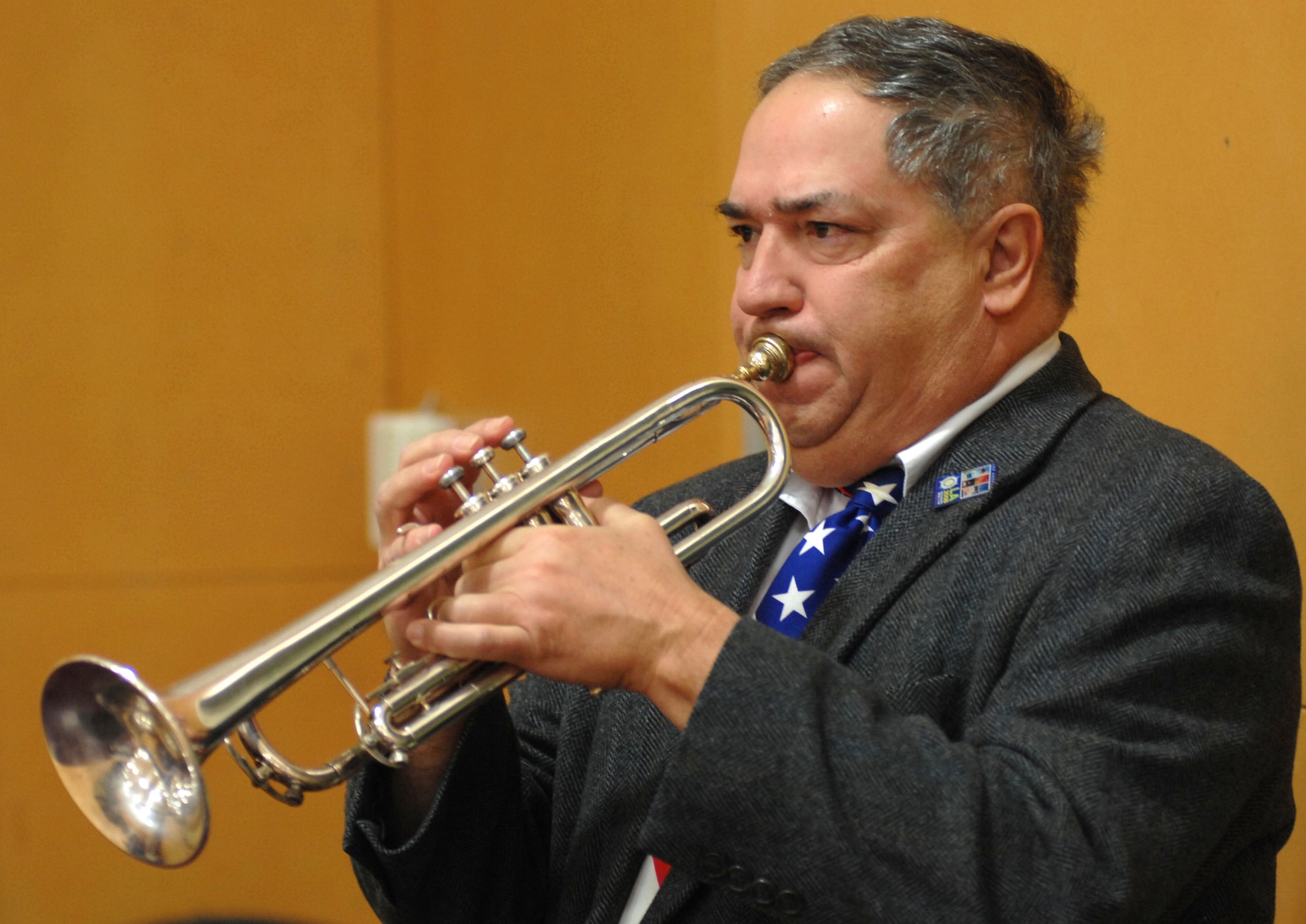 SANTA MARIA, Calif.-- Kirk Lindsey, Director of Community Development, plays Taps during a Memorial Dedication on December 7. The ceremony was held to honor Shawn Dressler, a Santa Maria native, who died in Iraq June 2.(U.S Air Force Photo by Airman 1st Class Stephanie Longoria).