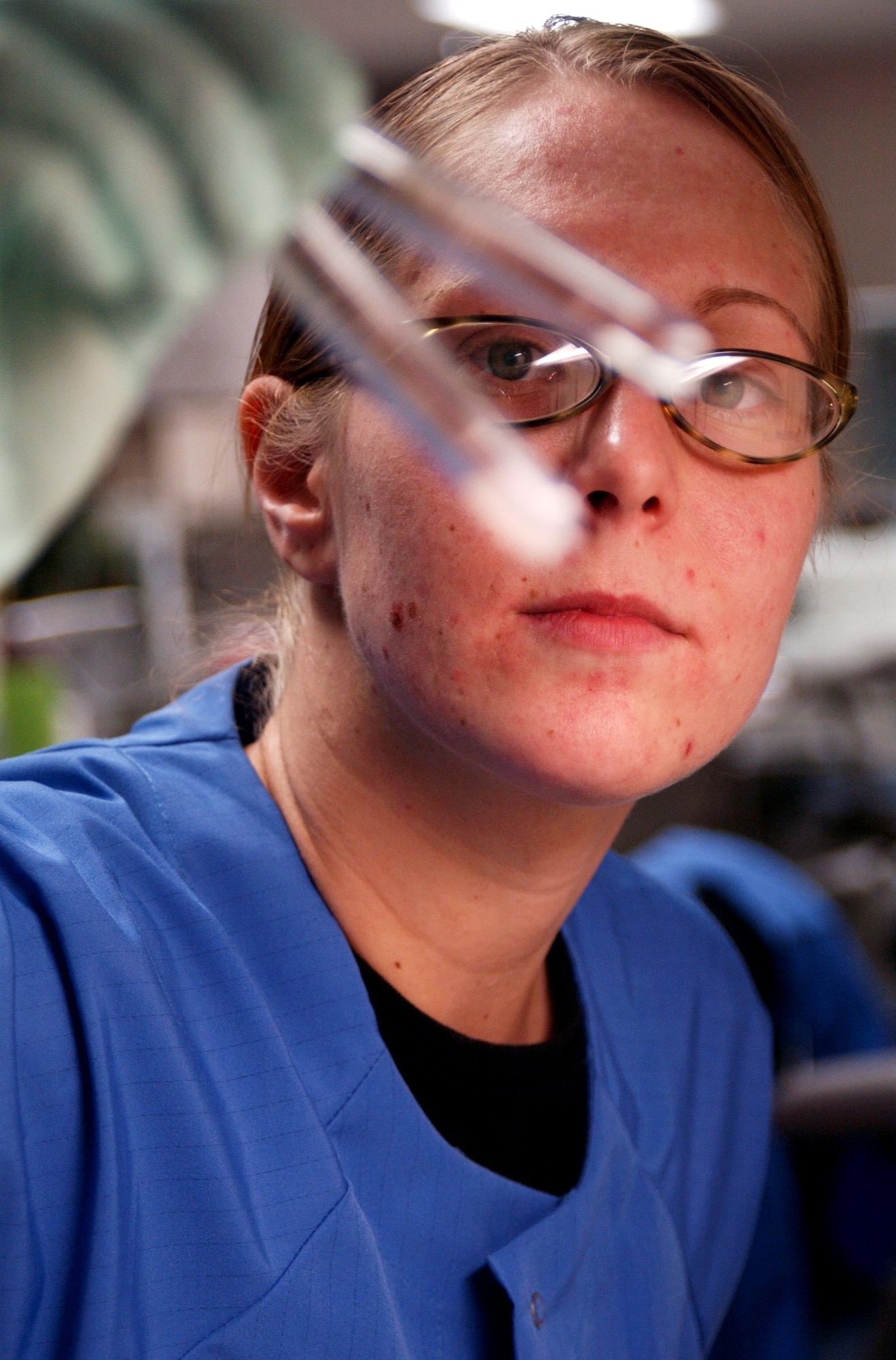 354th Medical Group Laboratory Technician U.S Air Force Staff Sgt. Melissa Diaz visually inspect a fluid sample for traces of protein by comparing the sample to a control fluid sample on December 12, 2007 at Eielson AFB, AK.  If a protein is present the fluid sample will turn a different color in comparison to the control sample.  U.S Air Force laboratory technicians uses various methods to test for any abnormalities such as bacteria in blood and fluid samples for clinical diagnosis.

(U.S Air Force photo by Staff Sgt Eric T. Sheler)
