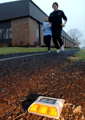 One of hundreds of solar powered running lights currently lining the rubberized track around the Scott Air Force Base flightline.