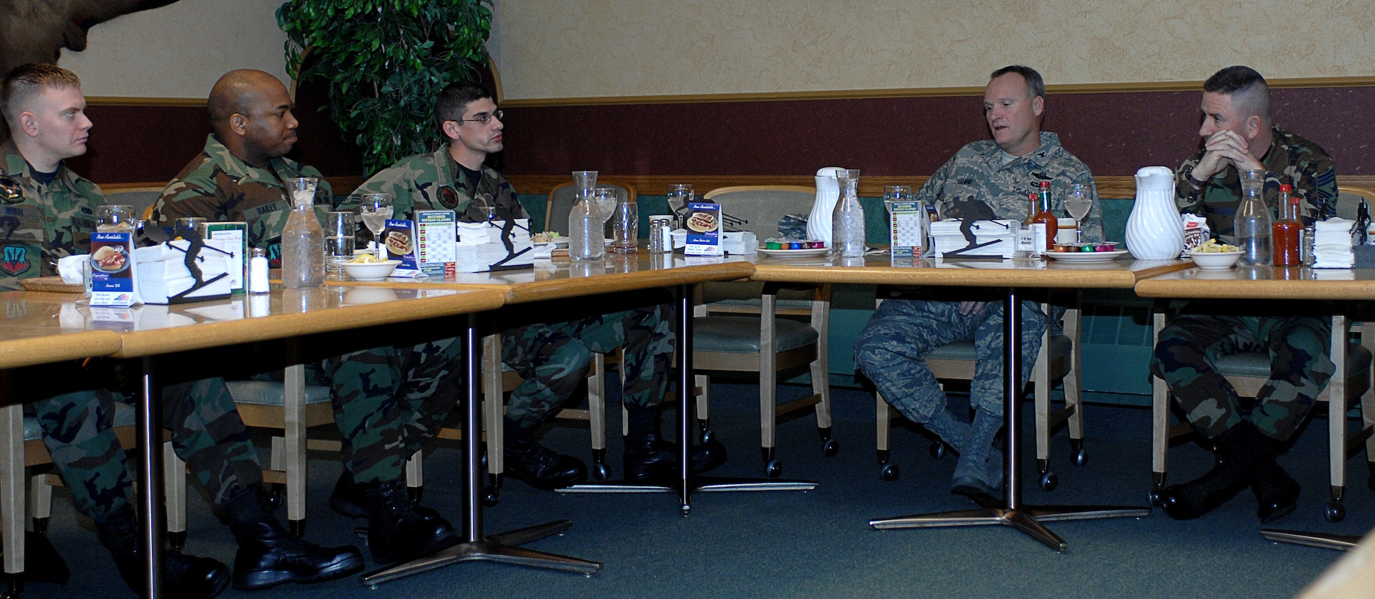 MOUNTAIN HOME AIR FORCE BASE, Idaho -- Col. James Browne, 366th Fighter Wing commander, talks with almost 20 Airmen during a breakfast at the Wagon Wheel Dining Facility here Dec. 11. Colonel Browne, 366th FW commander, invited Airmen representing each squadron to chat with him about base events over breakfast. Each month, a group of airmen, junior non-commissioned officers or senior NCOs will have the opportunity to meet with the commander to address any questions or concerns they have and to discuss what’s happening around the base. (U.S. Air Force photo/Airman 1st Class Stephany Miller)