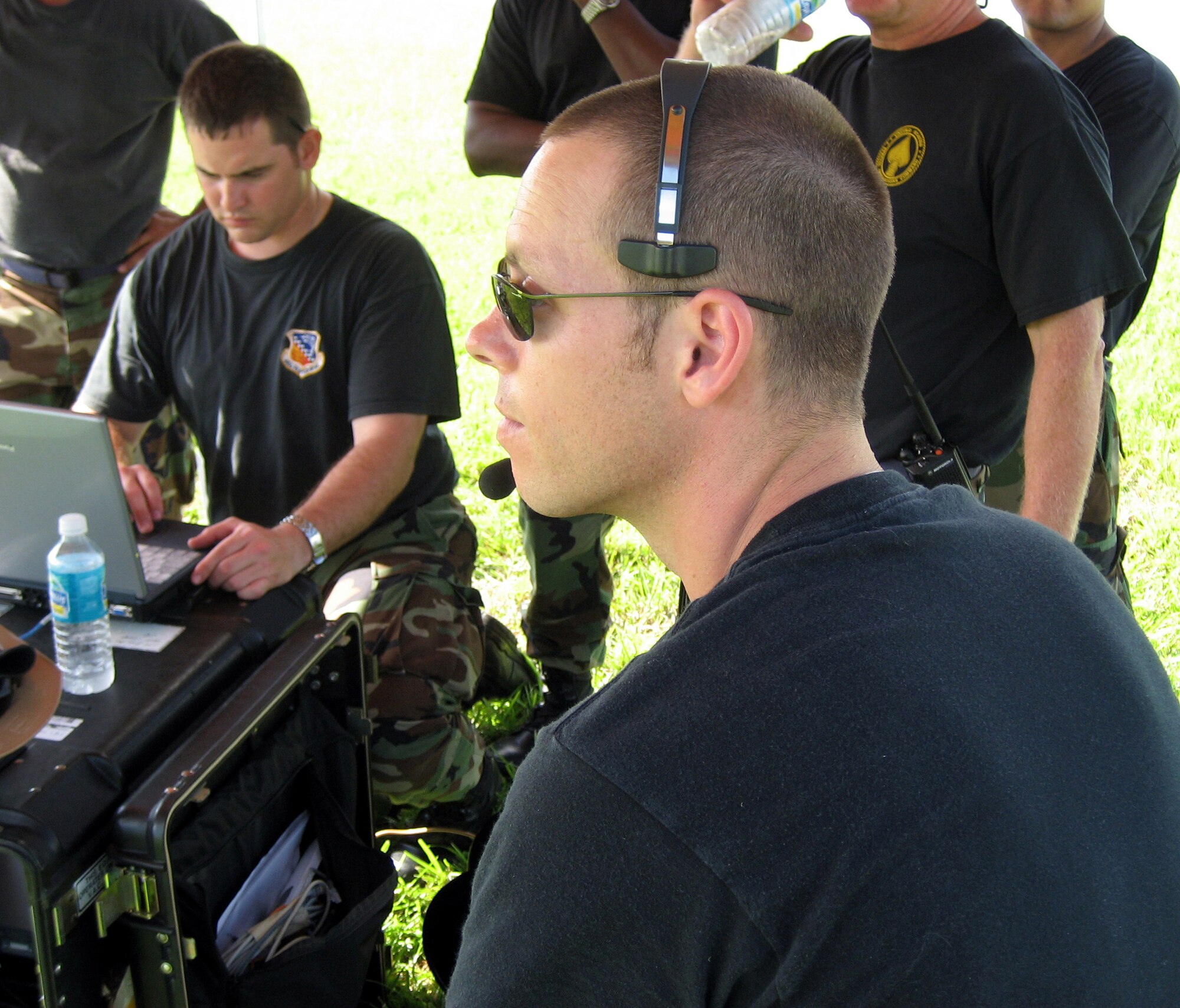 Staff Sgt. Brian Smith, a computer network systems technician with the 442nd Communications Flight, communicates with a remote site to optimize a radio frequency module voice and data link during exercise Tropic Link held from Oct. 22 to 27, 2007 at Naval Air Station Key West Fla. Sergeant Smith is an Air Force reservist assigned to the 442nd Fighter Wing at Whiteman AFB, Mo. (U.S. Air Force photo/Tech. Sgt. Greg Knauff)