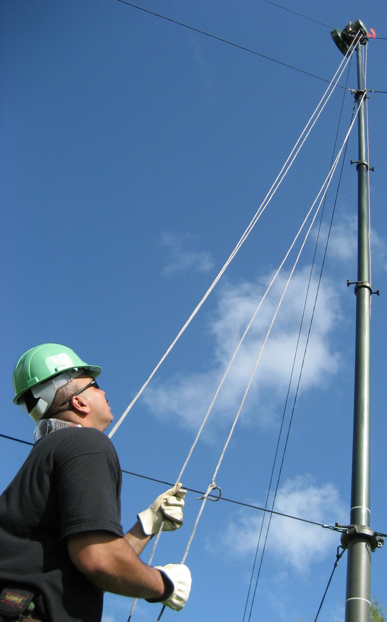 Master Sgt. Robert Pacheco, non-commissioned officer in charge of network administration for 442nd Communications Flight, adjusts the azimuth of a radio frequency module antenna atop a 35-foot pneumatic mast during exercise Tropic Link held from Oct. 22 to 27, 2007 at Naval Air Station Key West Fla. Sergeant Pacheco is an Air Force reservist assigned to the 442nd Fighter Wing at Whiteman AFB, Mo. (U.S. Air Force photo/Tech. Sgt. Greg Knauff)