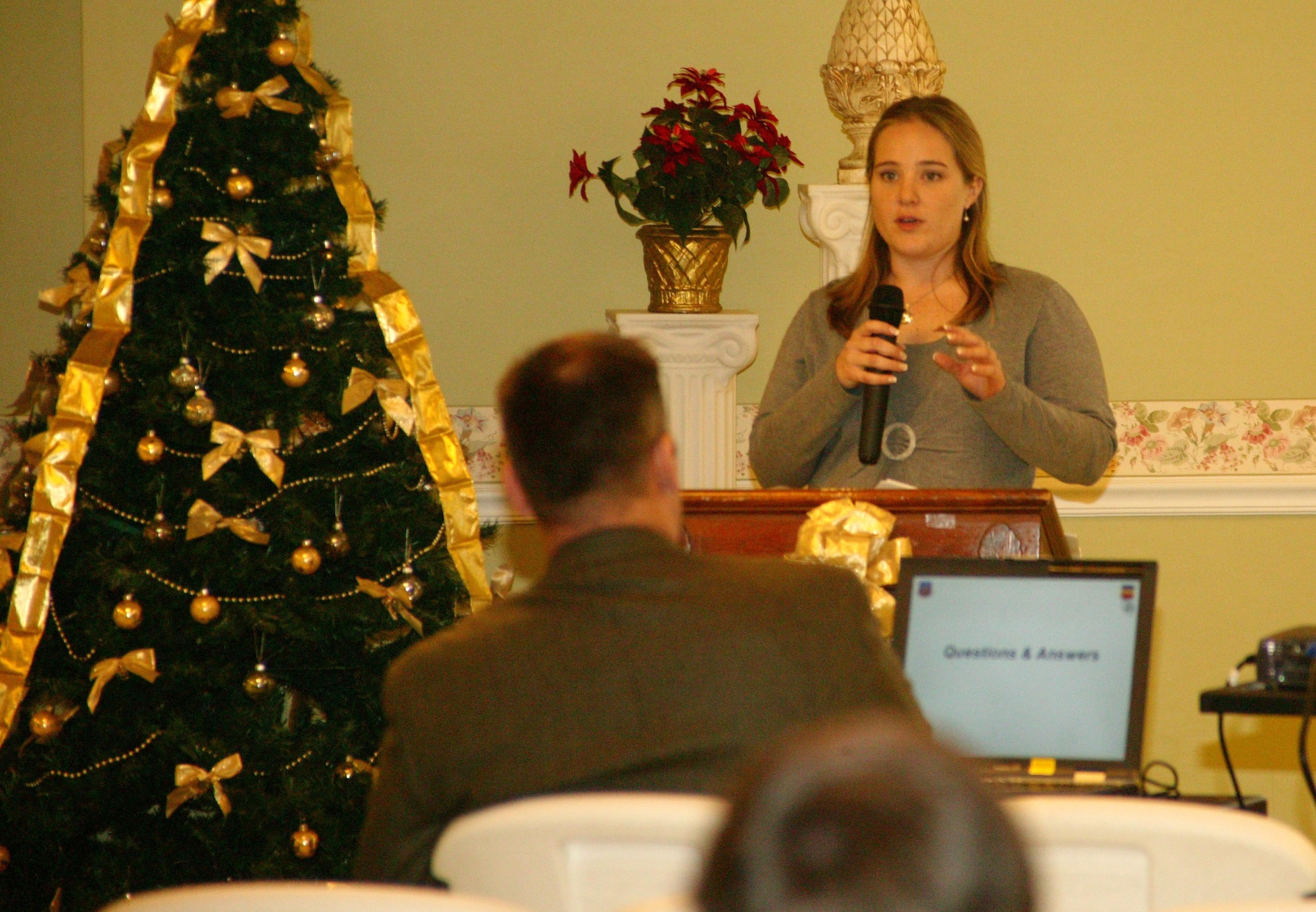 SHAW AIR FORCE BASE, S.C. -- Robyn Scott, LRS Federal, provides an update on a community survey recently completed regarding the Restoration Advisory Board's cleanup effort of trichloroethylene, or TCE, in local ground water. LRS Federal assists Shaw in gauging community reactions to the contamination. Shaw has been aggressively cleaning up TCE since the early 1990s. The purpose of the RAB meeting is to inform the public about the progress and answer any questions or concerns they may have. (U.S. Air Force photo/Tech. Sgt. Kevin Williams) 