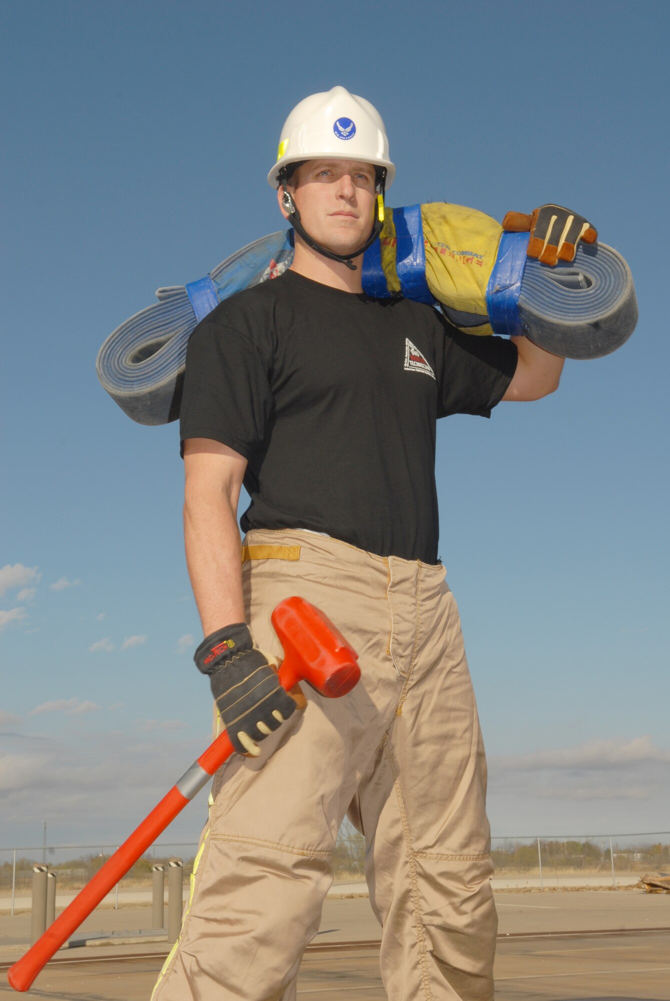 Staff Sgt. William Gates, a technical rescue instructor with the 312th Training Squadron and a member of Goodfellow Air Force Base’s premier international firefighter-combat-challenge team, the SAM Squad, was named the 2007 Goodfellow Air Force Base Athlete of the Year. (U.S. Air Force photo by Staff Sgt. John Barton)