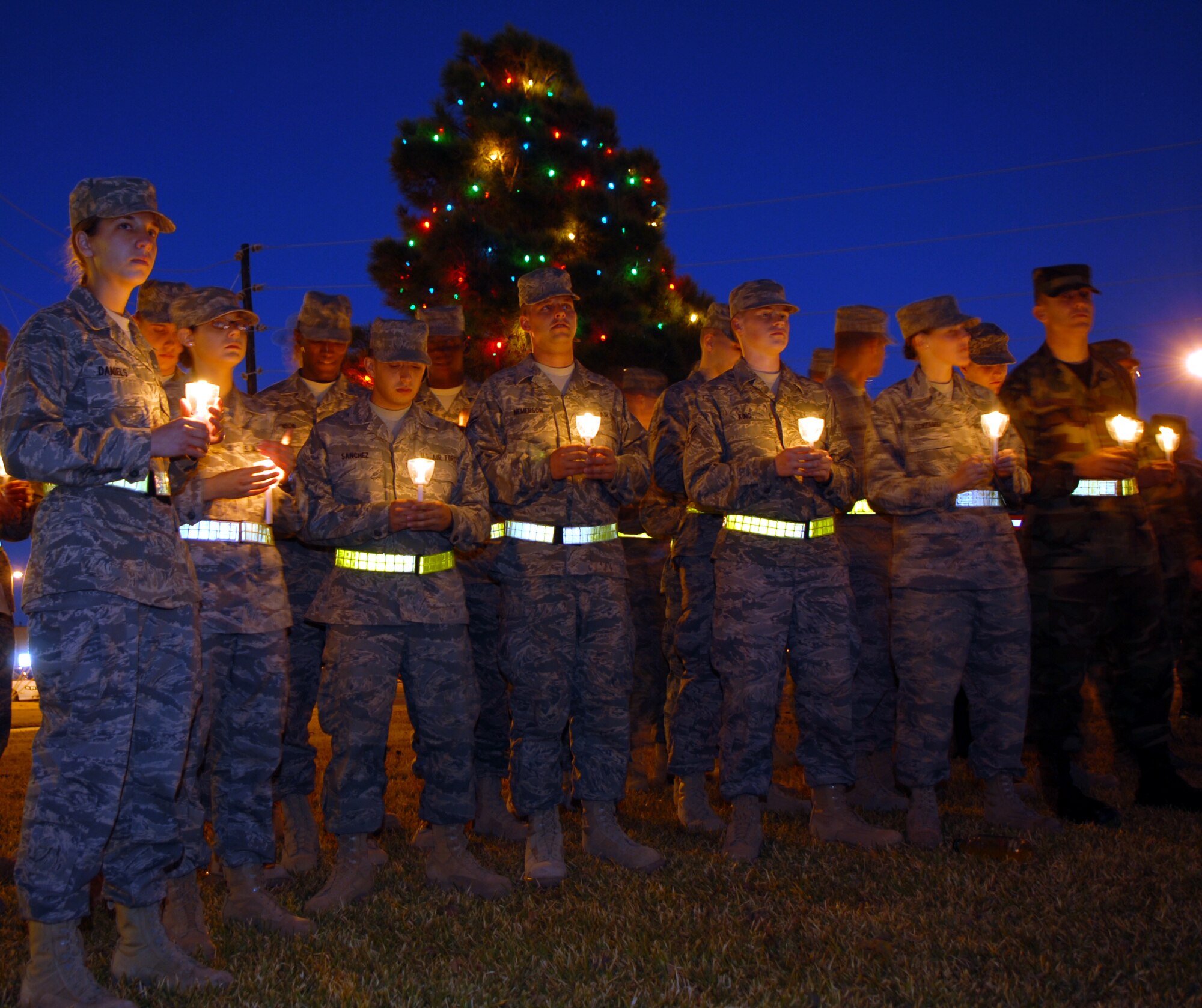 Guests at the Goodfellow Air Force Base Christmas tree lighting ceremony Dec. 6 were given a candle to hold during the event. (U.S. Air Force photo by Staff Sgt. John Barton)