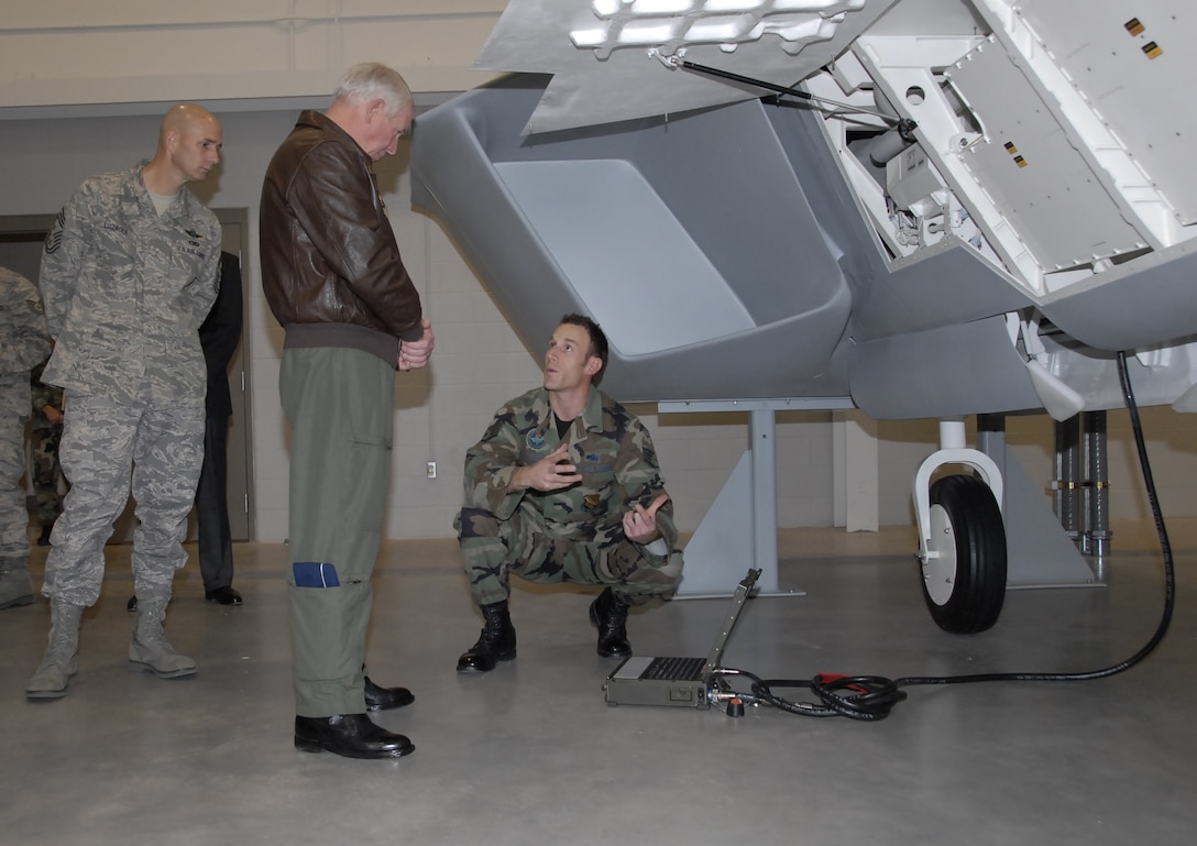 Gen. William R. Looney III, Air Education and Training Commander, and Chief Master Sgt. Mark R. Luzader, AETC command chief master sergeant, tour the new F-22 Raptor Maintenance Training Facility during the general's visit to Sheppard Nov. 29-30. (U.S. Air Force photo/Mike Litteken)