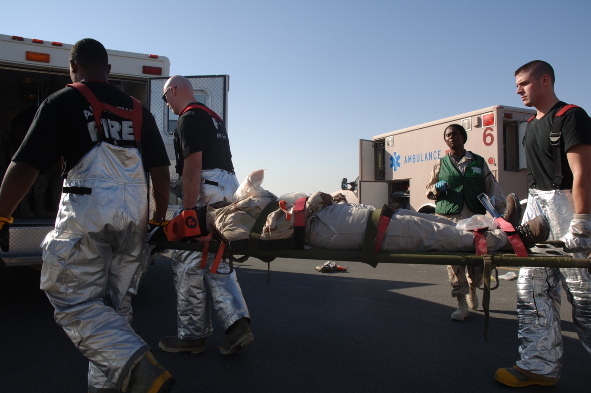 SOUTHWEST ASIA - Emergency services Airmen respond to victims following an aircraft incident during a Major Accident Response Exercise  at a Southwest Asia air base Dec. 14.  (U. S. Air Force photo/Staff Sgt. Douglas Olsen)