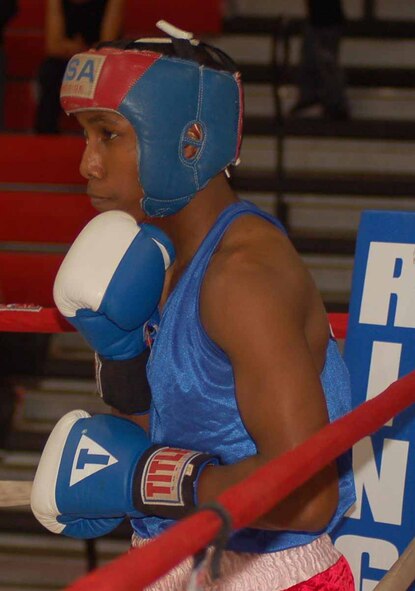 Tinker boxer Michael Hayward readies himself before the second round of his match  against Ramses Cortez.  (Air Force photo by John E. Banks)