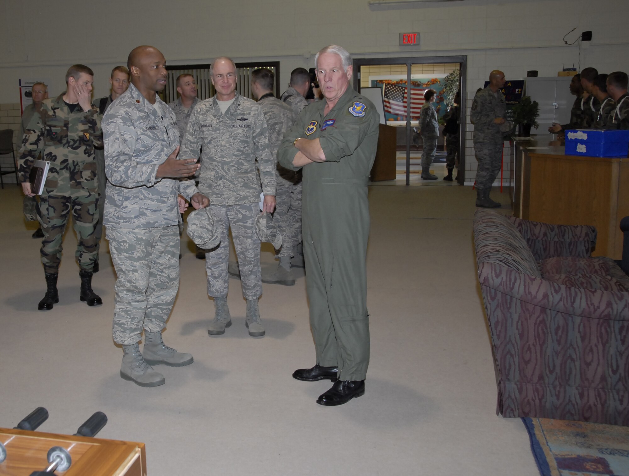 Chaplain (Maj.) Jimmie Sanders, 82nd Training Wing Chapel, shows Gen. William R. Looney III, Air Education and Training Commander, the Solid Rock Cafe during the general's visit to Sheppard Nov. 29-30. (U.S. Air Force photo/Mike Litteken)
