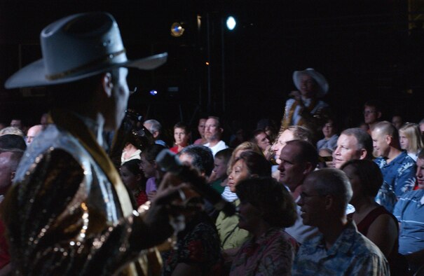 Members of the Air Force's premier performing team engage the audience during the Tops In Blue performance, Saturday night at Hangar 35. Photo by Staff Sgt. Erin Smith
