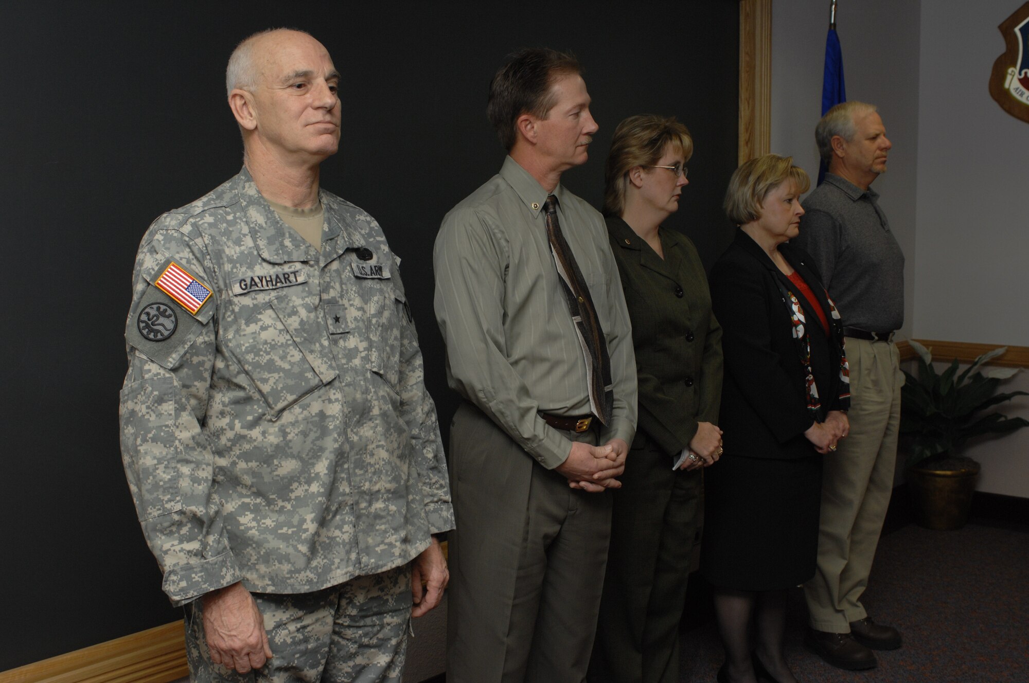 MOUNTAIN HOME AIR FORCE BASE, Idaho -- Left, Army Brig. Gen. Alan Gayhart, Idaho Air National Guard assistant adjutant, presented three Bronze Star Medals with Valor to Army Specialist Steven R. Elrod’s family here Dec. 17. Specialist Elrod was posthumously presented the award for actions in support of Operation Iraqi Freedom May 13, but was killed in a vehicle accident in Baghdad Sept. 10. His father, retired Master Sgt. Denny Elrod, and his stepmother, Susan Elrod from the 366th Logistics Readiness Squadron, received one of the three medals for his actions while his grandparents Bob and Mary Morin received the other two. (U.S. Air Force photo/Airman 1st Class Ryan Crane)