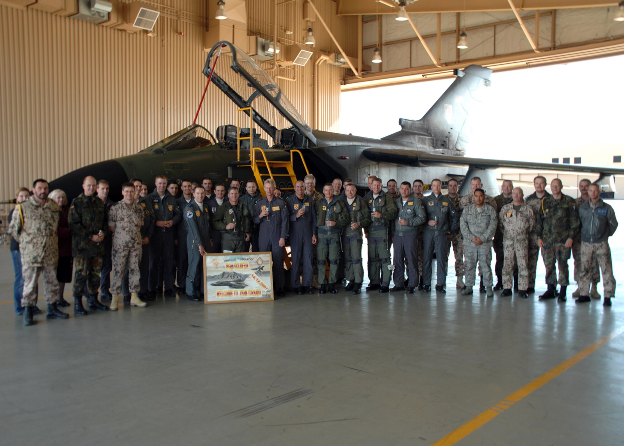 Members of Team Holloman take a group photo after Brig. Gen. David Goldfein's first flight in the German Tornado Dec. 14, 2007, at Holloman Air Force Base, N.M. (U.S. Air Force photo/Airman 1st Class Jamal D. Sutter)