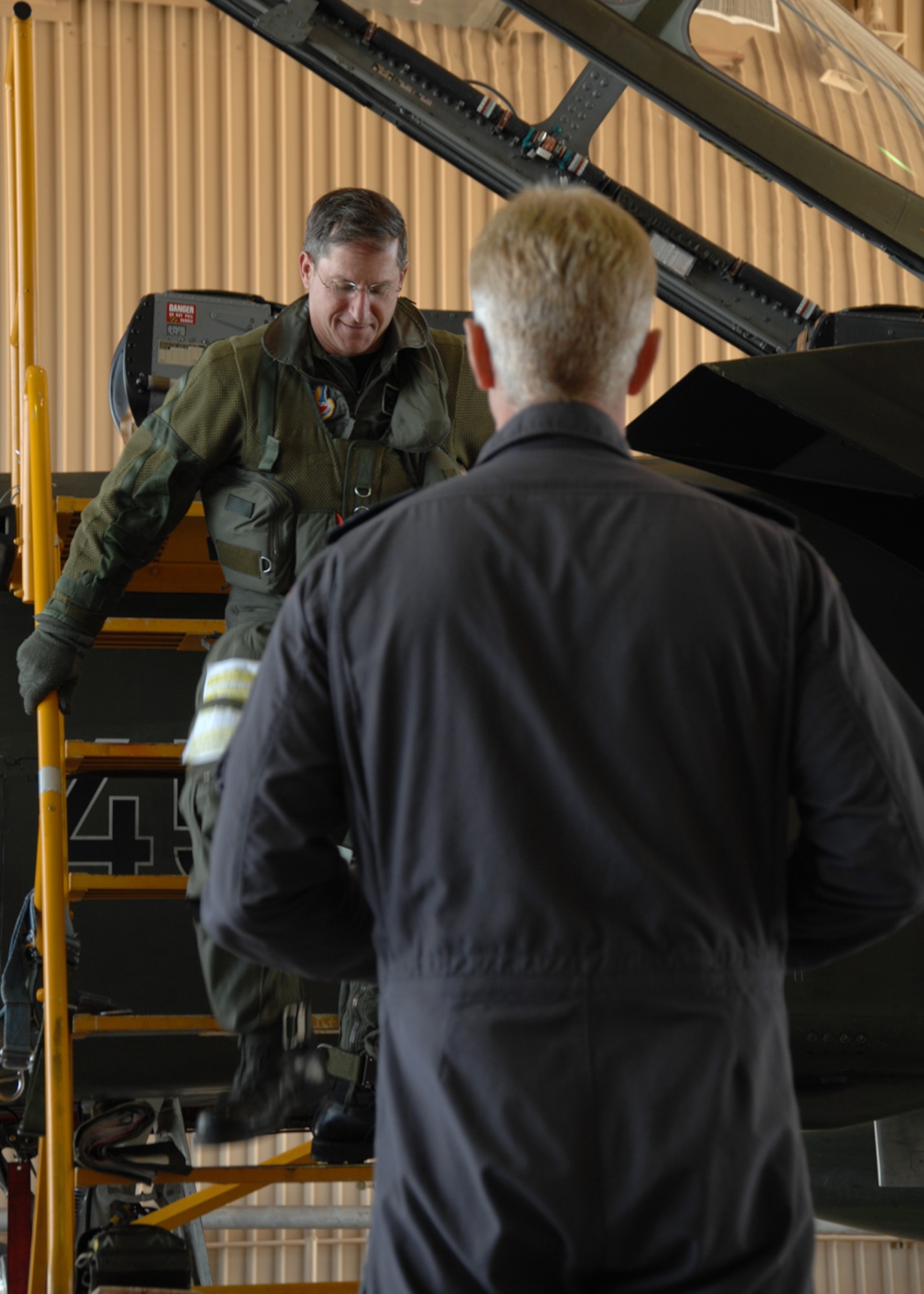 Brig. Gen. David Goldfein, 49th Fighter Wing commander, is welcomed by Col. Peter Klement, German Air Force Flight Training Center commander, after a succesful flight in the German Tornado Dec. 14, 2007, at Holloman Air Force Base, N.M. This was Brig. Gen. Goldfein's first flight in the Tornado. (U.S. Air Force photo/Airman 1st Class Jamal D. Sutter)