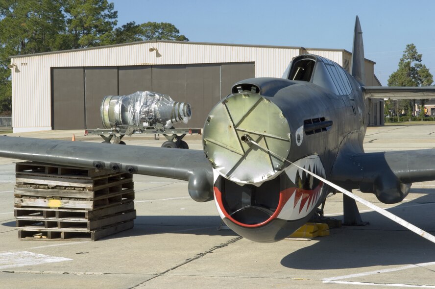 A P-40 Warhawk flown by the Flying Tigers recently arrived at Moody Air Force Base with other display aircraft from Pope AFB N.C. The P-40 was used by the Flying Tigers in 1941 when the American Volunteer Group was assisting the Republic of China Air Force. The planes are scheduled to be displayed at an airpark currently in the planning stage. (U.S. Air Force photo by Senior Airman Elizabeth Rissmiller)