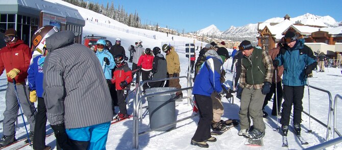 2nd Lt. Dan Jimenez, 741st Missile Security Forces Squadron, and 1st Lt. Alex Courtney, 341st Operations Support Squadron, get their lift tickets scanned as they prepare to head up the slopes at the Big Sky resort. Big Sky held a Military Appreciation weekend Dec. 7 to 9. (U.S. Air Force photo/Airman 1st Class Emerald Ralston)