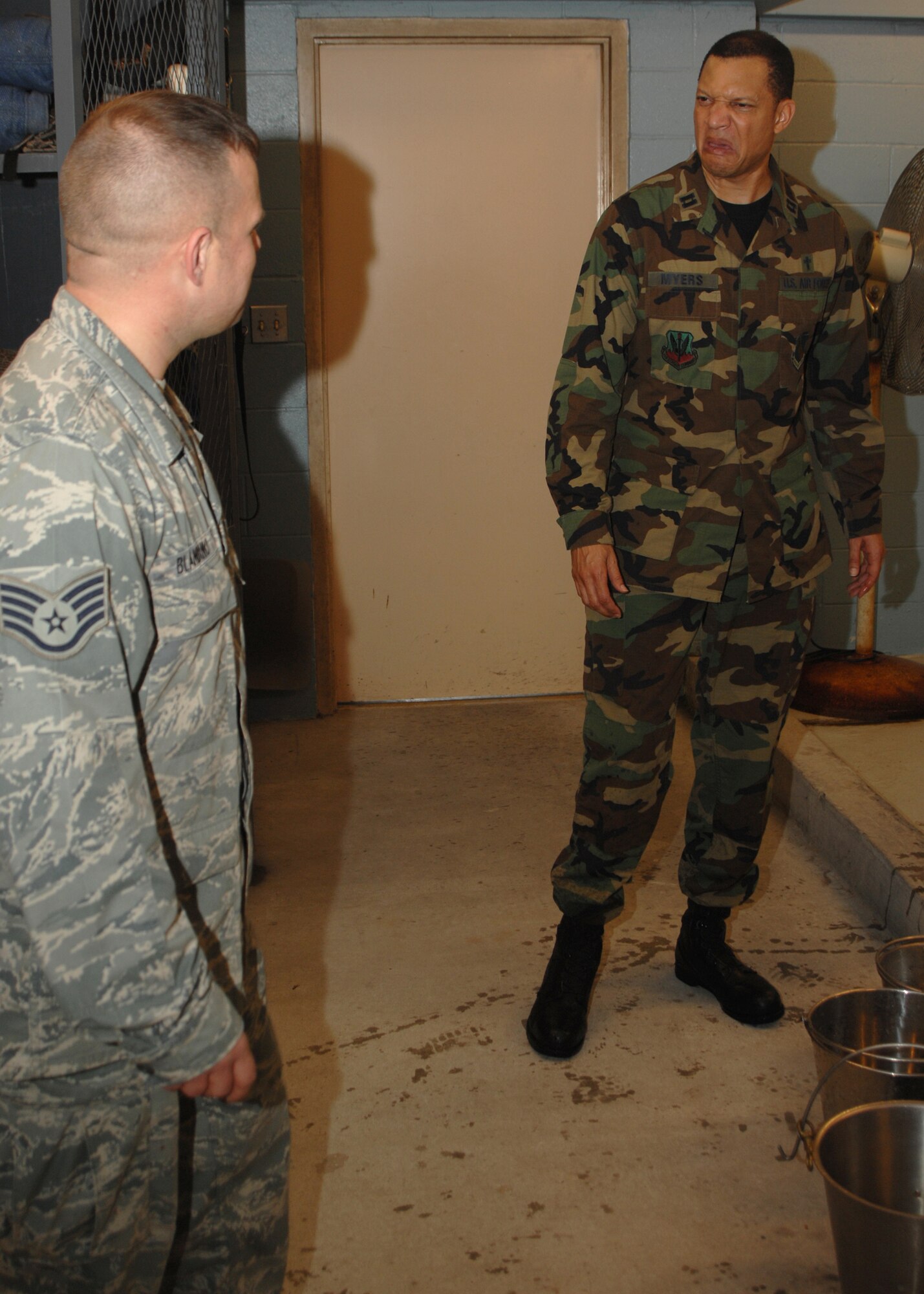 SEYMOUR JOHNSON AIR FORCE BASE, N.C. - Captain Michael Myers, Wing  Chaplain, 4th Fighter Wing, expresses his thoughts on cleaning dog kennels on December 13. Chaplain Michael Myers offers help to all 4th Fighter Wing Personnel through the Base Chapel and around the Wing. (U.S. Air Force photo by Airman 1st Class Jonathon Williams)