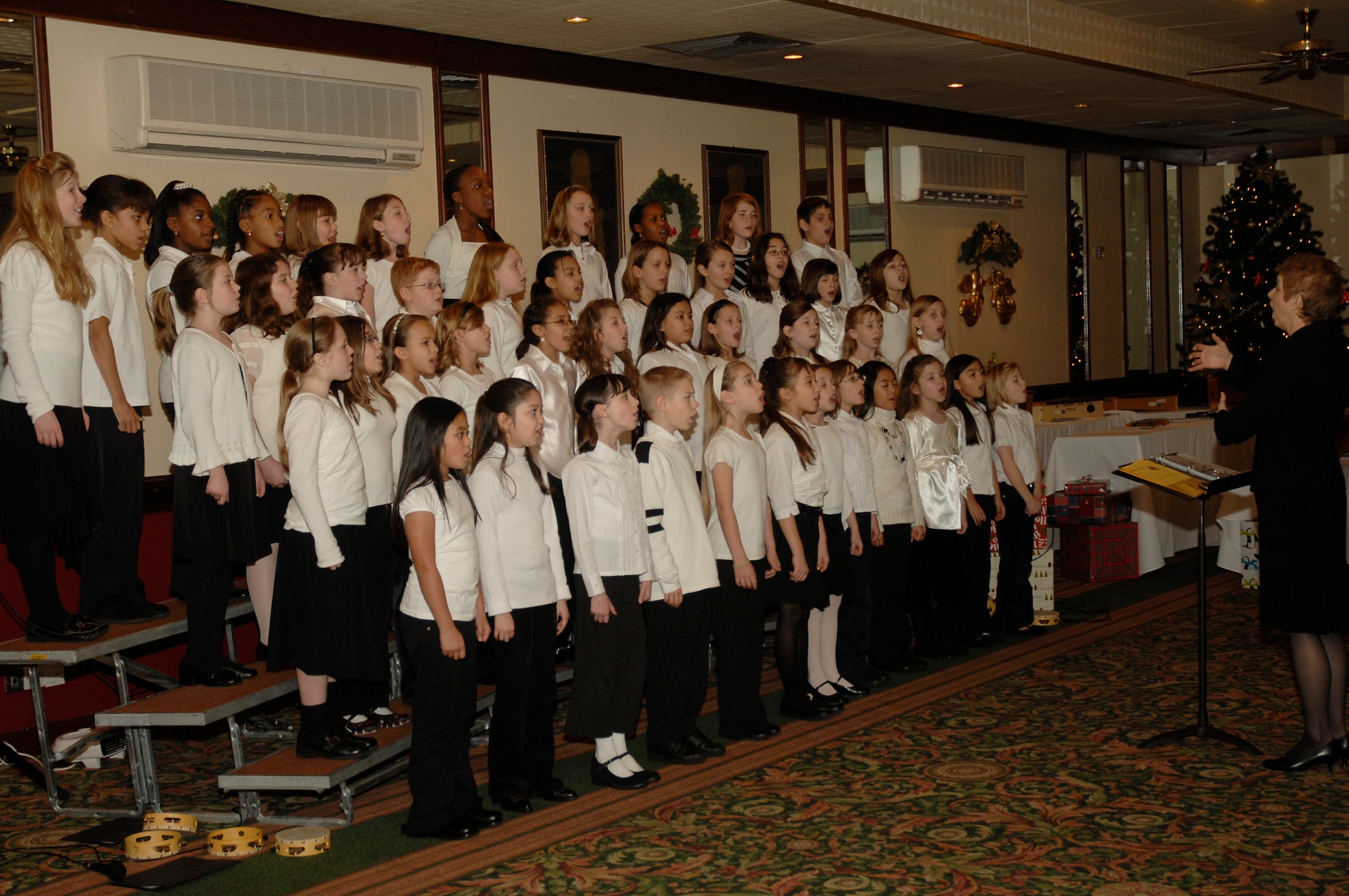 The Lakenheath Intermediate School chorus performs at a Winter Concert, Dec. 12, at RAF Lakenheath, England. Mrs. Debra Libby directed the concert with songs sang in English, French and Hebrew. (U.S. Air Force photo by Airman 1st Class Erika Brooke)
