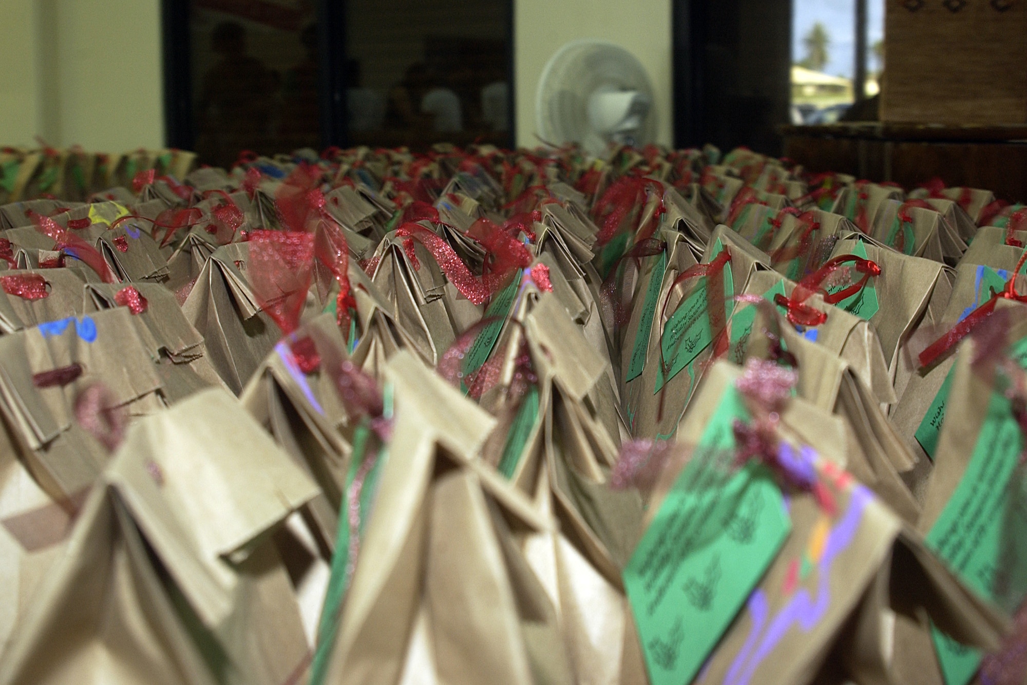 More than 800 goodie bags were packed by volunteers during the Cookie Caper event held Dec. 17. The purpose Cookie Caper is to bring a "taste of home" to Andersen Airmen away from their families during the holidays. (U.S. Air Force photo/Airman 1st Class Carissa Morgan)