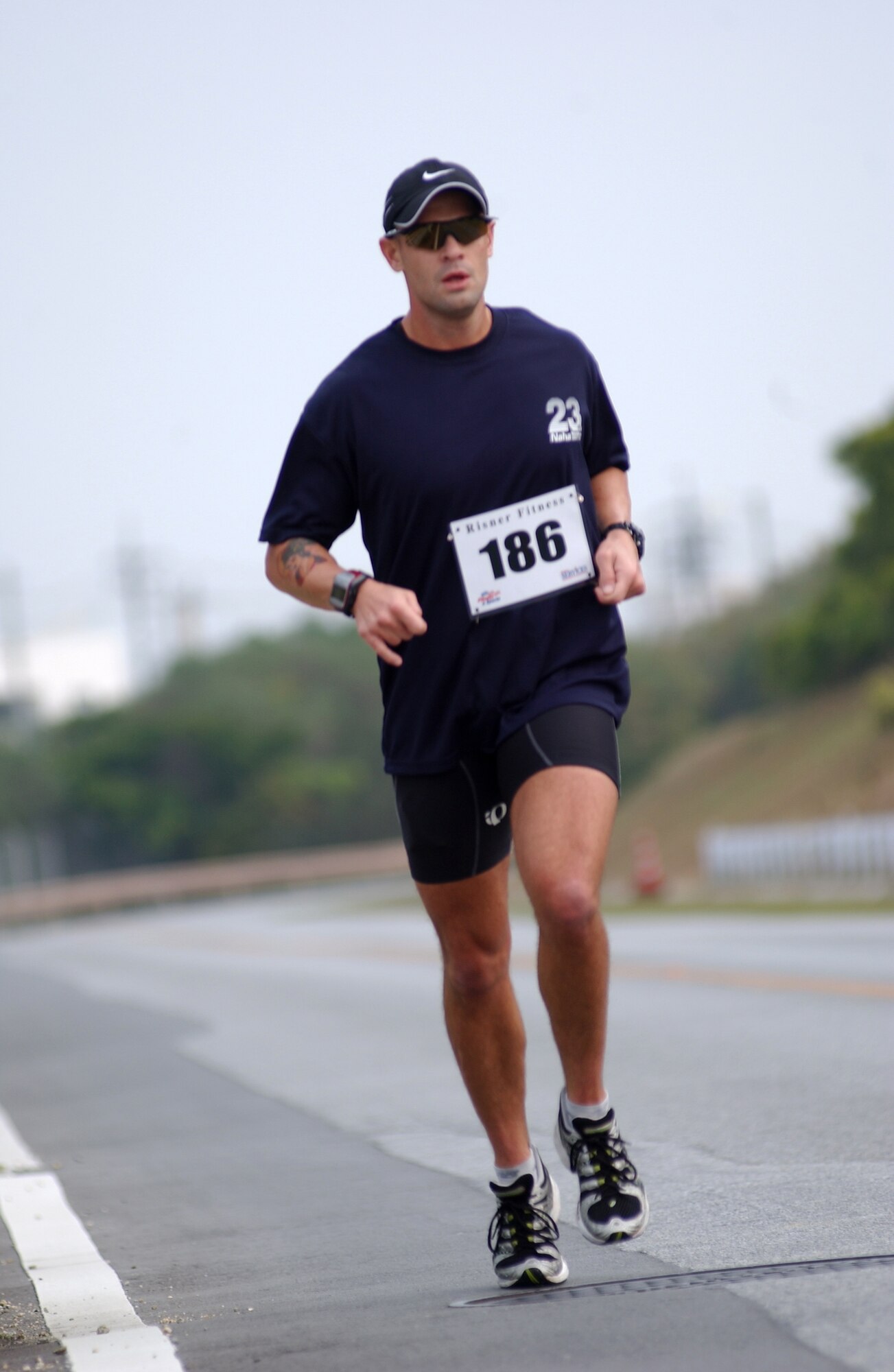 Thomas Shinn, 961st Airborne Air Control Squadron, runs toward the next checkpoint during the first Kadena Biathlon Dec. 15. The biathlon route was approximately 26 kilometers (16 miles). Airmen, Soldiers, Sailors, Marines, civilians and family members participated in the Kadena Top 3-sponsored event.
(U.S. Air Force/Senior Airman Nestor Cruz)