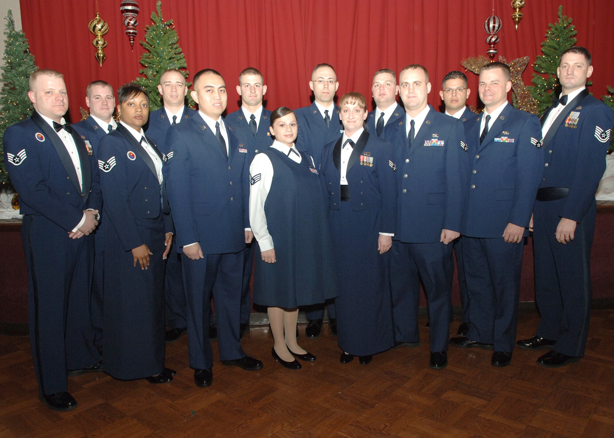 FAIRCHILD AIR FORCE BASE, Wash. – Airman Leadership School Class 08-B Flight stands for their group photo prior to the ALS graduation.  The entire class of 22 senior airmen graduated Dec. 13. The class motto was, “Leaders, supervisors, and mentors helping others unlock doors for success.” (U.S. Air Force photo/Senior Airman Jocelyn A. Ford)