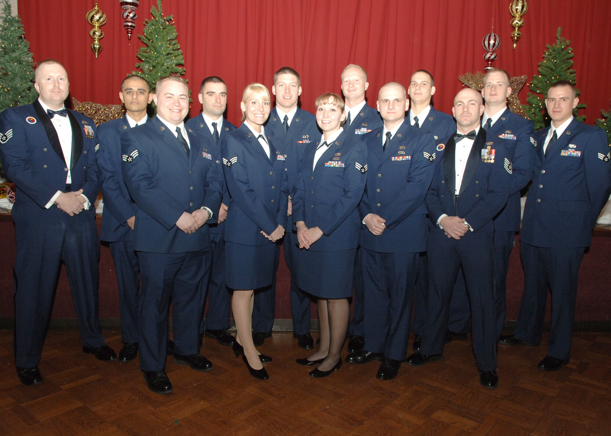 FAIRCHILD AIR FORCE BASE, Wash. – Airman Leadership School Class 08-A Flight stands for their group photo prior to the ALS graduation. The entire class of 22 senior airmen graduated Dec. 13. The class motto was, “Leaders, supervisors, and mentors helping others unlock doors for success.” (U.S. Air Force photo/Senior Airman Jocelyn A. Ford)