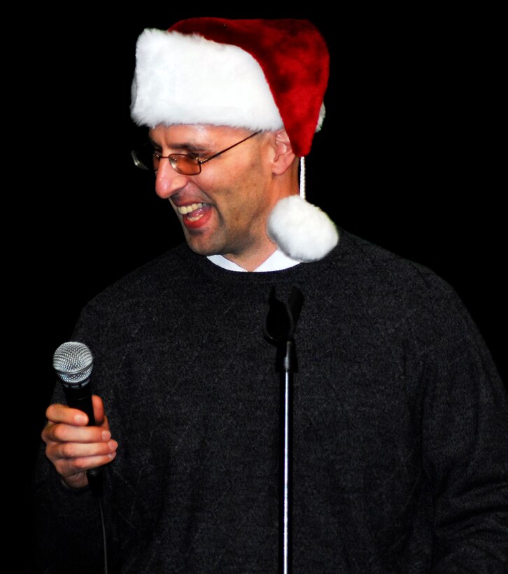 Capt. Paul Hubenthal sings karaoke at the ARPC Holiday Party on Dec. 14. More than 250 people attended this year's party. (U.S. Air Force photo/Ellen Edwards)