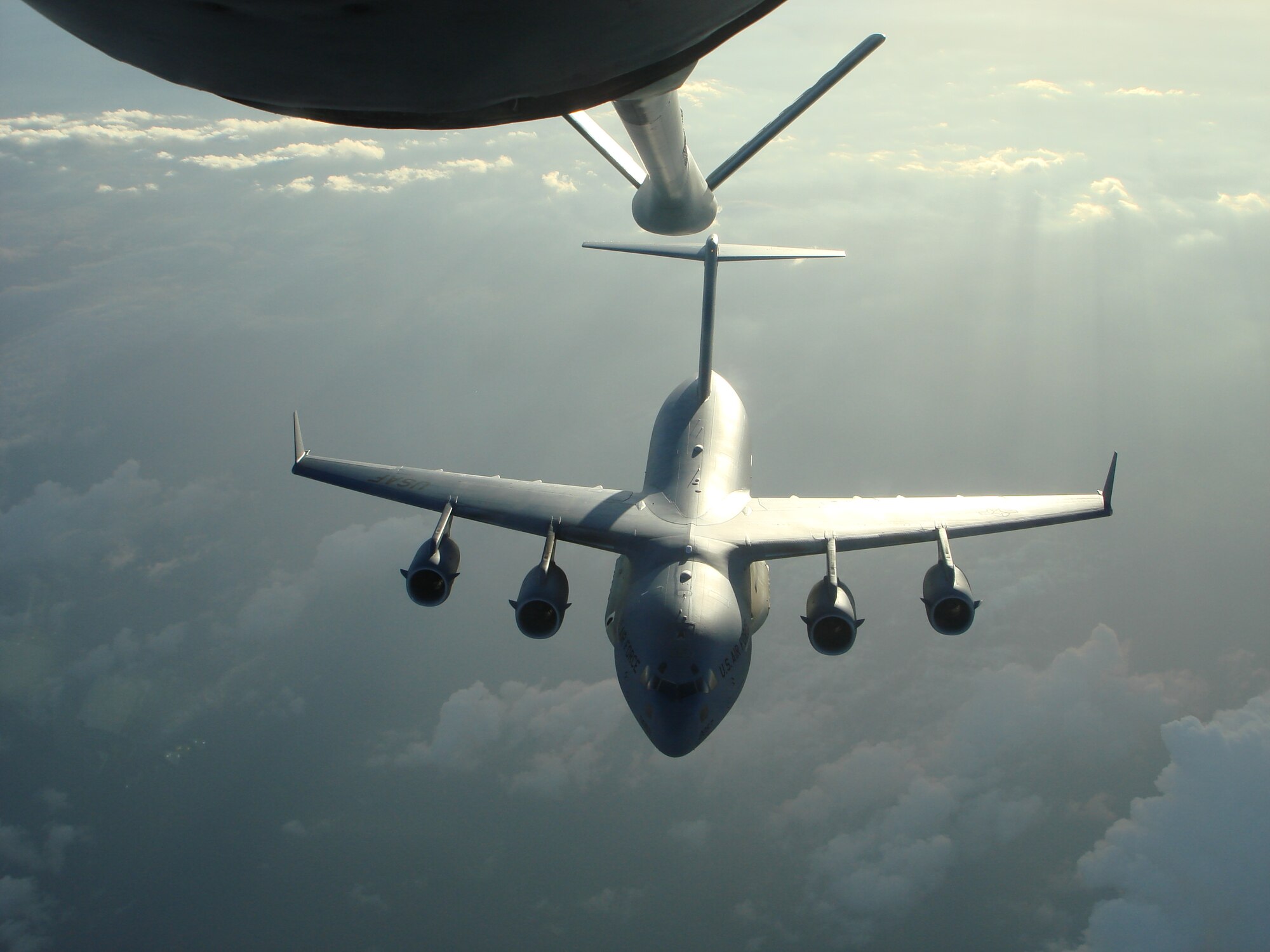 A C-17 Globemaster III from McChord's 7th Airlift Squadron being refueled by an 817th Expeditionary Airlift Squadron KC-135 Stratotanker over the Black Sea supporting continuing operations in Operation Iraqi Freedom. (Courtesy photo.)