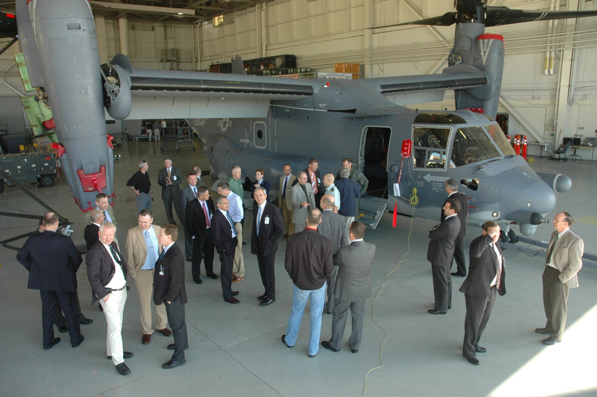 NATO senior military officers tour a CV-22 static display  as part of the 20th Annual NATO Joint Senior Pyschological Operations Conference hosted by the U.S. Air Force Special Operations School Dec. 11-14 at Hurlburt Field, Fla. The theme of this year's conference was "measures of effectiveness." (U.S. Air Force photo/1st Lt. Amy Cooper)