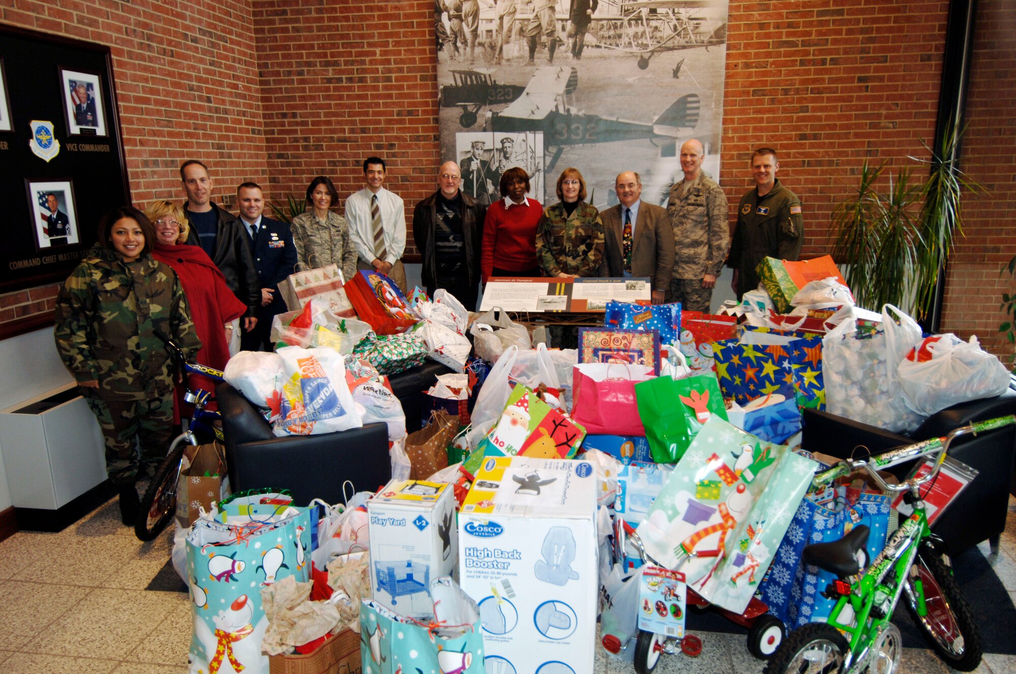 SCOTT AIR FORCE BASE, Ill. -- Members of Air Mobility Command’s Directorate of Strategic Plans, Requirements and Programs and Directorate of Manpower and Personnel gathered toys to be donated to local children. This year’s annual holiday gift drive was aimed at collecting presents for infants through age 17 in the St. Clair/Monroe County Court Appointed Special Advocates. The program provides trained volunteers who advocate for the best interest of abused or neglected children in the juvenile court system. (U.S. Air Force photo by Tech. Sgt. Tony Tolley)