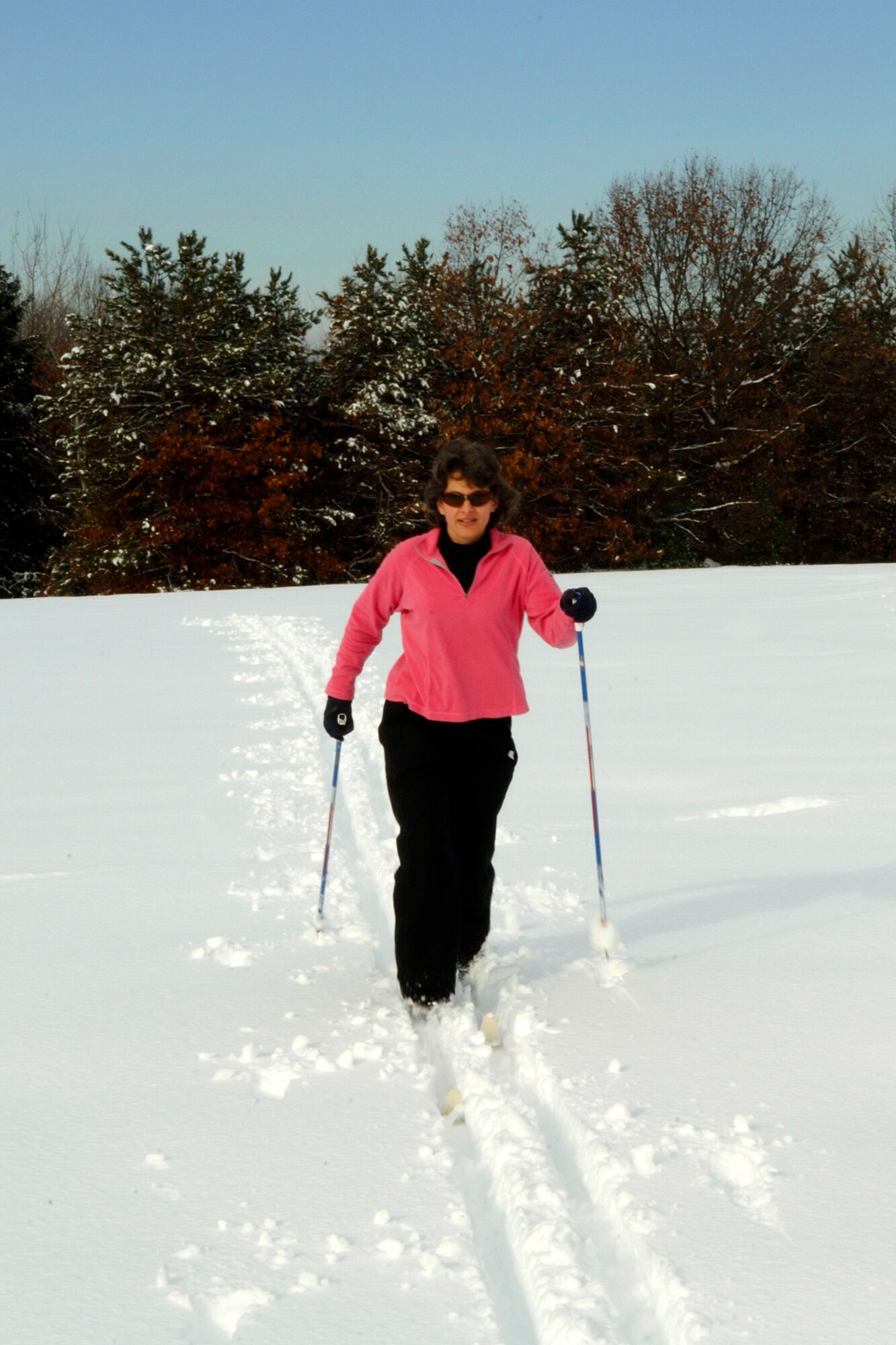 HANSCOM AFB, Mass. -- Carla Parish, wife of 66th Mission Support Group Deputy Commander Lt. Col. Gerry Parish, cross country skis through a field of snow on base Dec. 14. (U.S. Air Force photo by Jan Abate.)