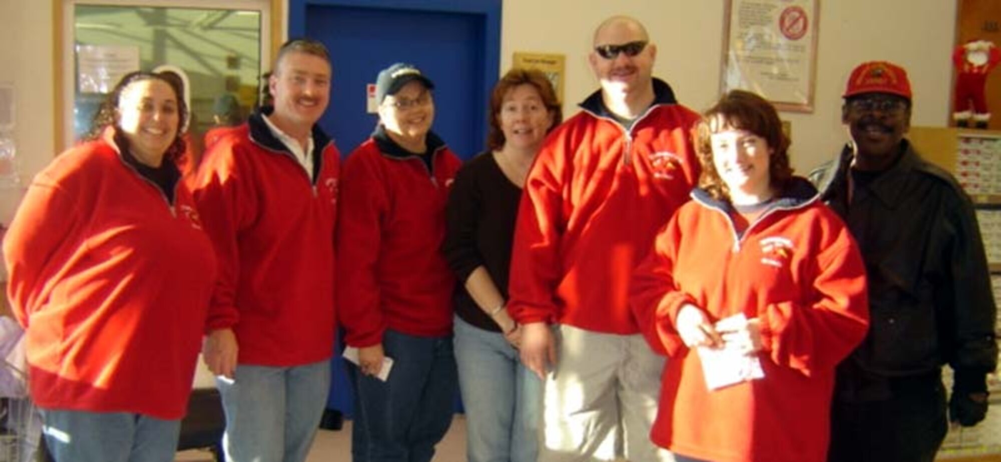 SPANGDAHLEM AIR BASE, Germany -- Members of the Spangdahlem Spouses and Enlisted Members Club performed random acts of kindness at the Spangdahlem and Bitburg commissaries, when they purchased more than $5,000 worth of groceries for more than 100 E-5s and below and their families Dec. 15 - 17, 2007. (Courtesy photo) 