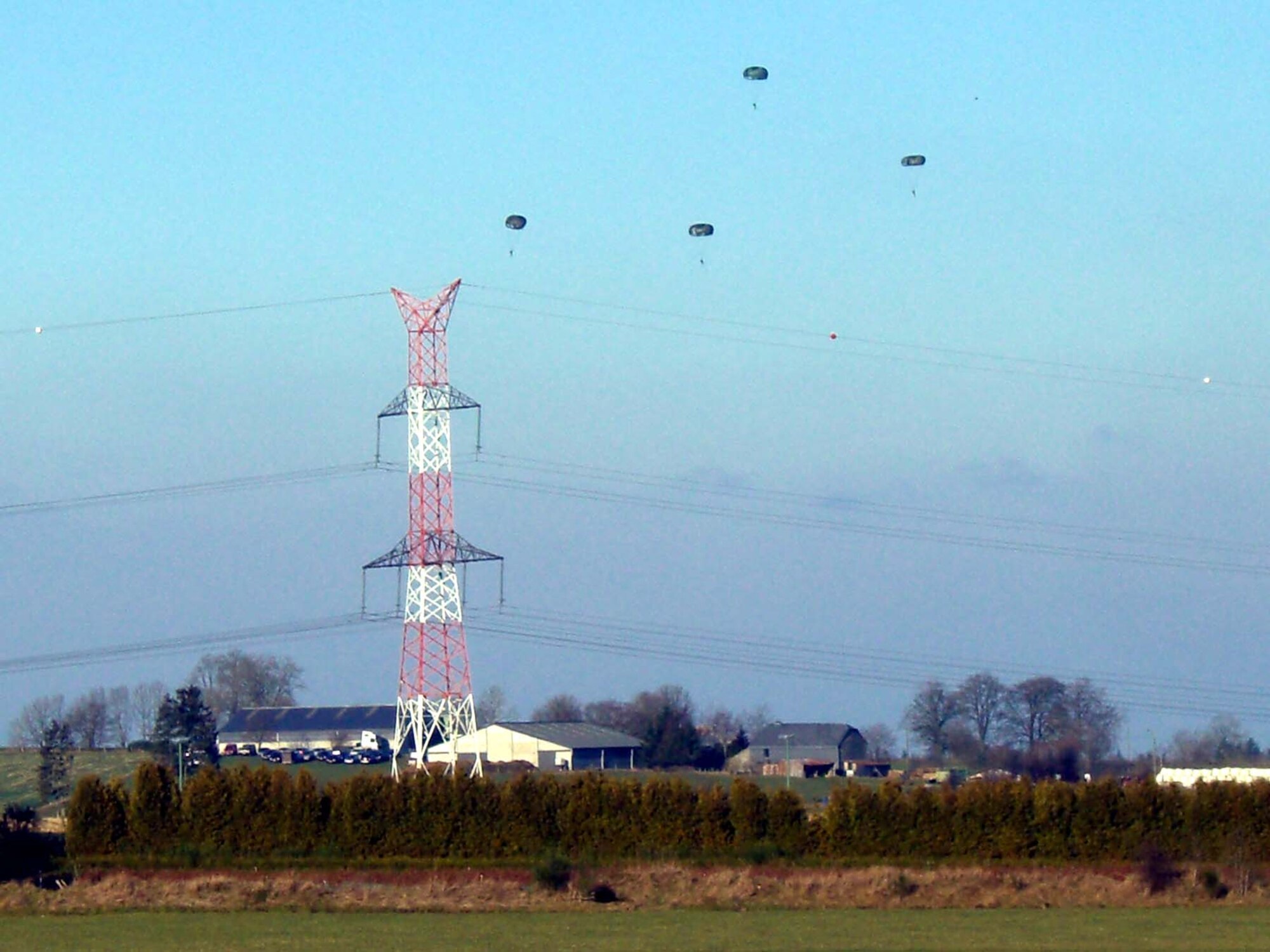 BASTOGNE, Belgium -- Paratroopers make the jump during activities marking the 63rd anniversary of the Battle of the Bulge in Bastogne, Belgium Dec. 15, 2007. (U.S Air Force photo/Capt. Kevin Coffman)