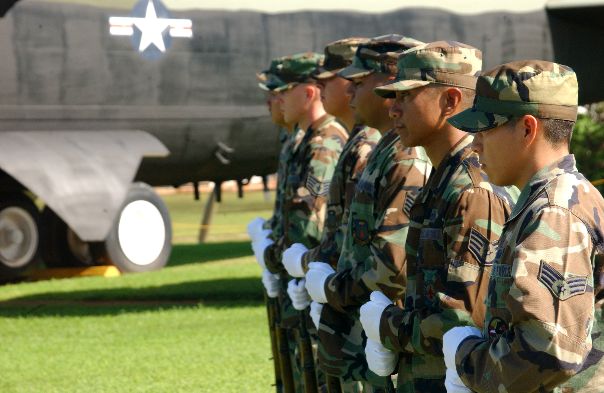 The firing detail stands with their weapons ready at the Linebacker II memorial held here December 18. The firing party, in which each Airman has a fully operational M-1 Garand, fired three rounds each of 7.62mm blank ammunition. This tradition is a proud legacy of American military heritage and is used to mark solemn occasions such as this one. (Air Force photo/Tech. Sgt. Steven Wilson)